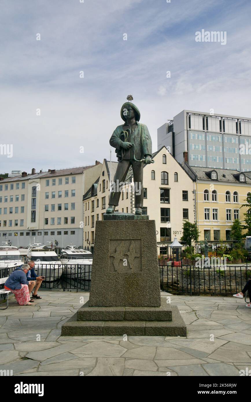 Ålesund: Skarungen fisher boy statue in Alesund, Norway. A monument ...