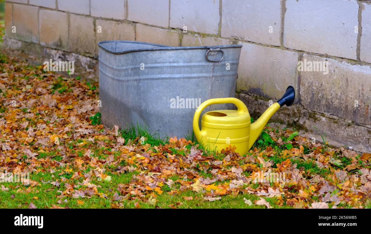 A metal bath with water. Technical water, reserve for watering against