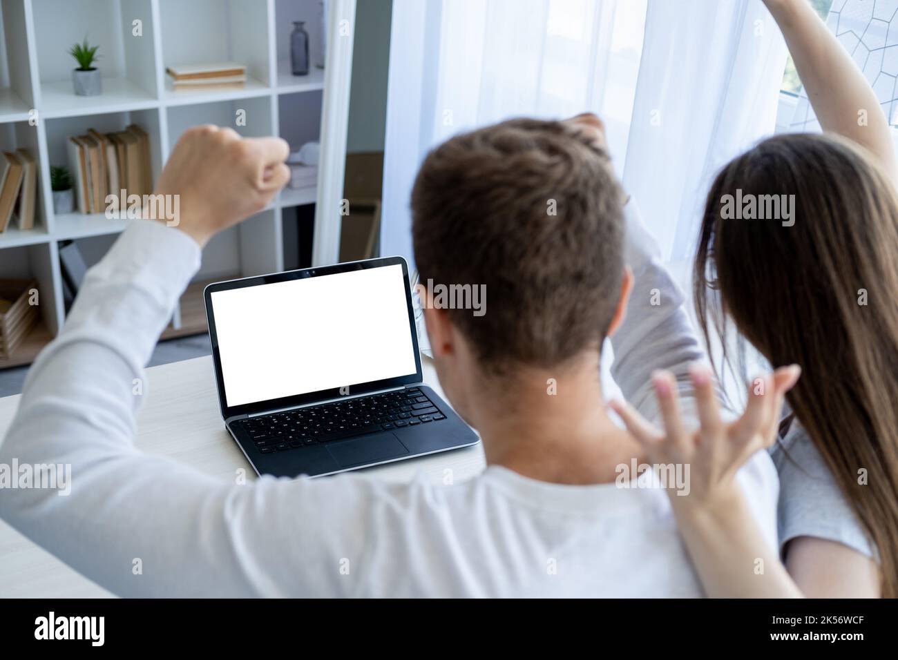 winner excitement happy couple computer mockup Stock Photo