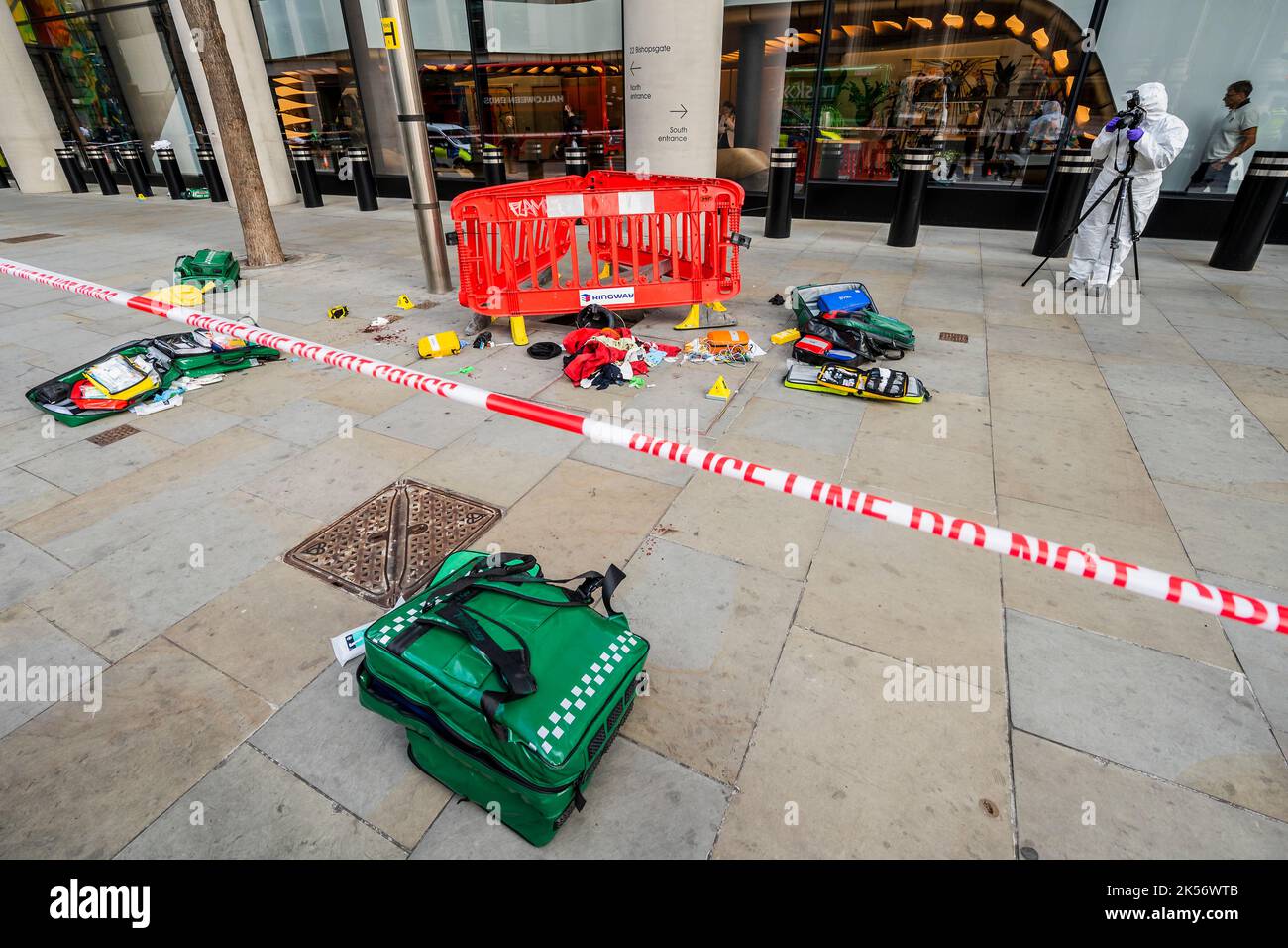 City Of London, UK. 06th Oct, 2022. Paramedics bags have been left incase they help with forensic evidence - City of London Police and their forensics team investigate a triple stabbing outside 22 Bishopsgate. Credit: Guy Bell/Alamy Live News Stock Photo