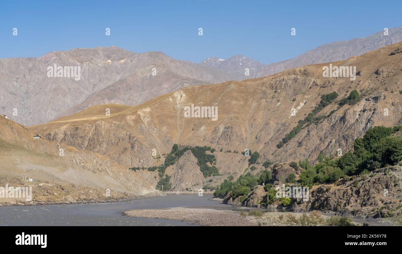 Scenic mountain landscape panorama of the Panj river valley bordering Afghanistan, Darvaz, Gorno-Badakshan, Tajikistan Stock Photo