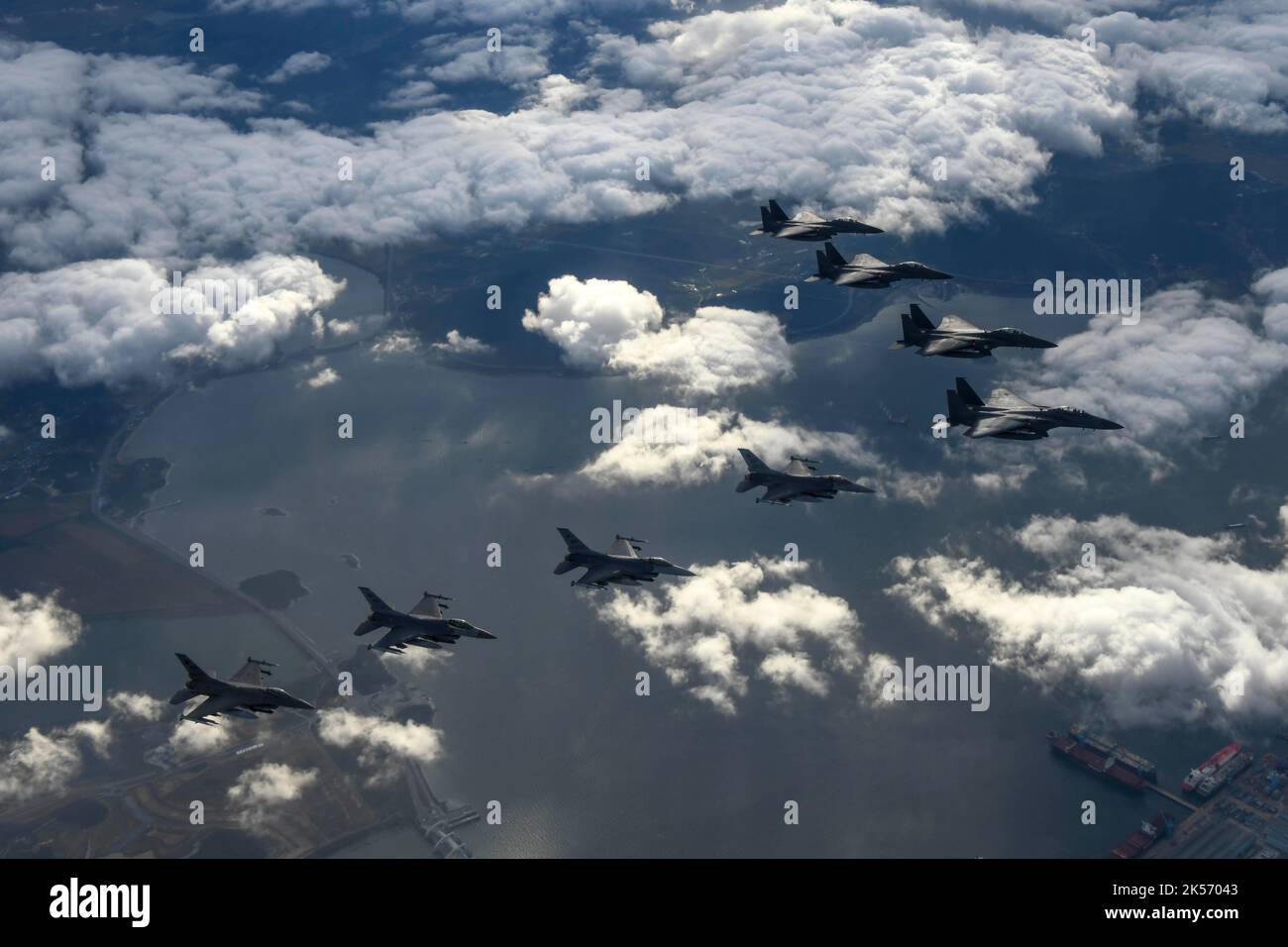 Jikdo Island, South Korea. 04th Oct, 2022. Four Republic of Korea Air Force F-15K Slam Eagle fighter aircraft, and four U.S. Air Force F-16 fighters participated in a combined attack squadron demonstration by boming the uninhabited island of Jikdo, October 4, 2022 over the Yellow Sea, South Korea. Credit: Jeremy Buddemeier/US Air Force/Alamy Live News Stock Photo