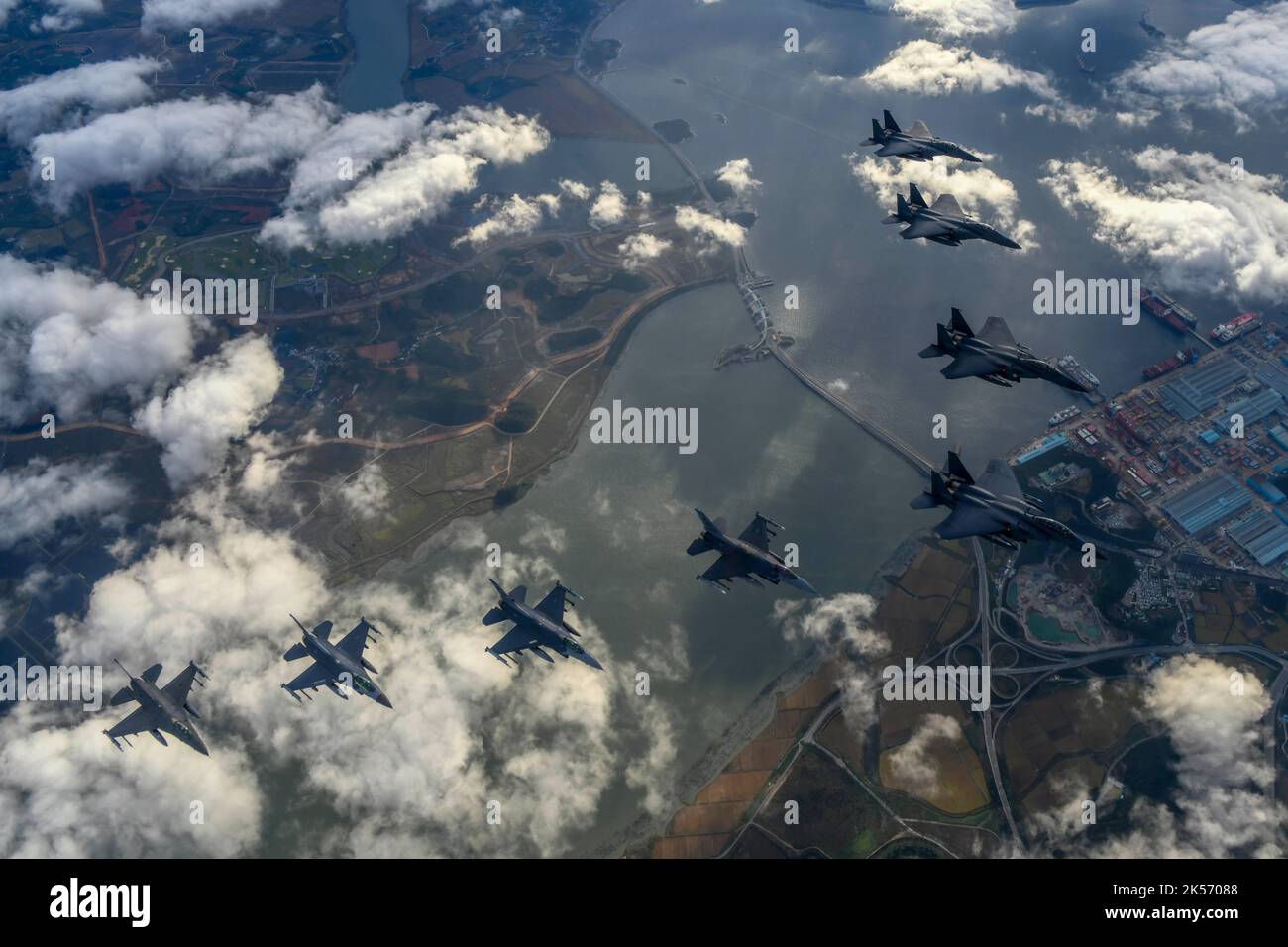 Jikdo Island, South Korea. 04th Oct, 2022. Four Republic of Korea Air Force F-15K Slam Eagle fighter aircraft, and four U.S. Air Force F-16 fighters participated in a combined attack squadron demonstration by boming the uninhabited island of Jikdo, October 4, 2022 over the Yellow Sea, South Korea. Credit: Jeremy Buddemeier/US Air Force/Alamy Live News Stock Photo