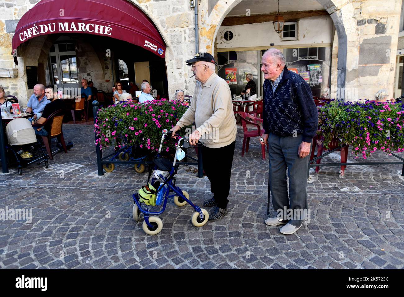 Two elderly French men out for a Sunday stroll in the Lot-et-Garonne department, Southwestern France Stock Photo