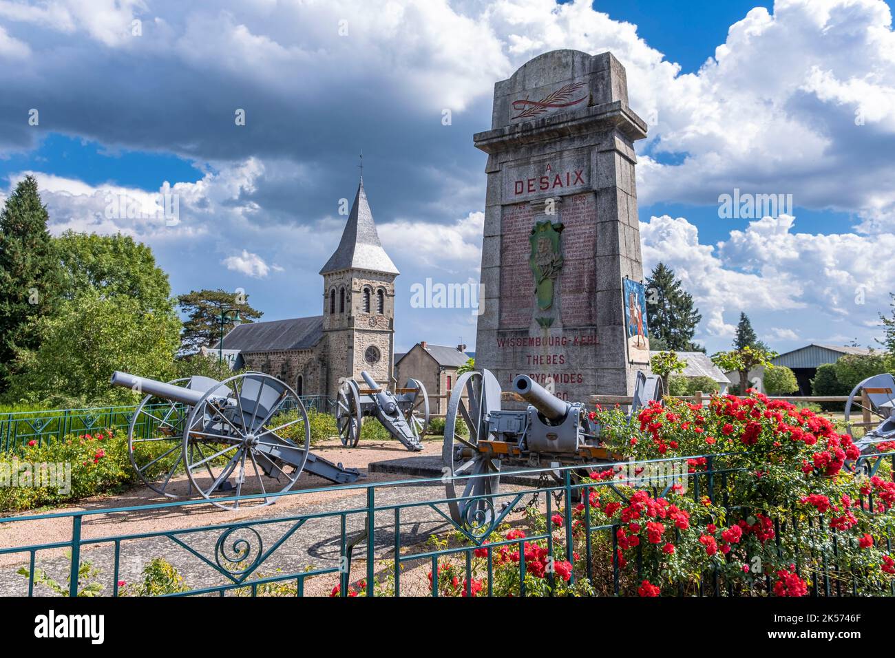 France, Puy de Dome, Ayat sur Sioule, Saint-Hilaire church and stele to General Desaix, a native of the village, recalling his military campaigns Stock Photo