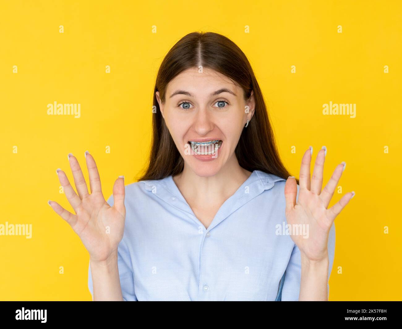 scary emotion gesturing woman frighten situation Stock Photo