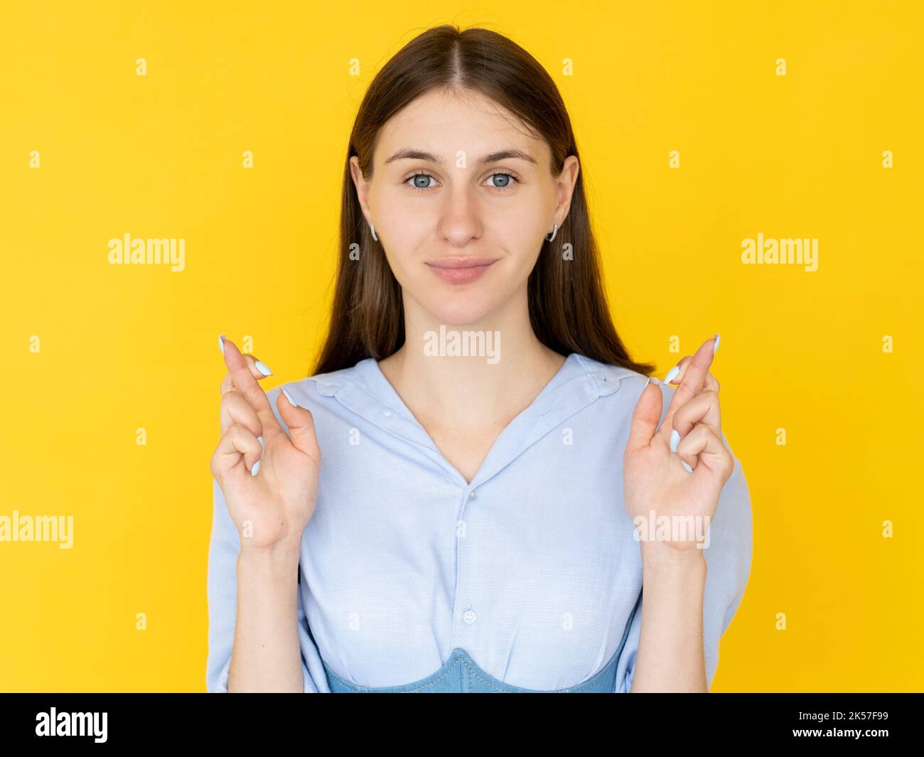 good luck praying woman hopeful believes pretty Stock Photo - Alamy