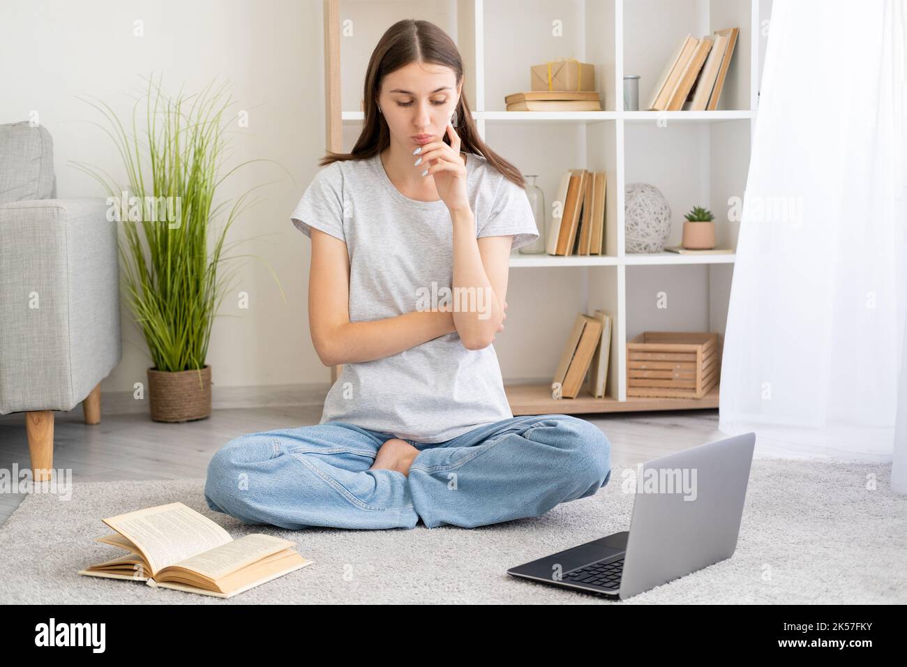 distance education considering woman online Stock Photo