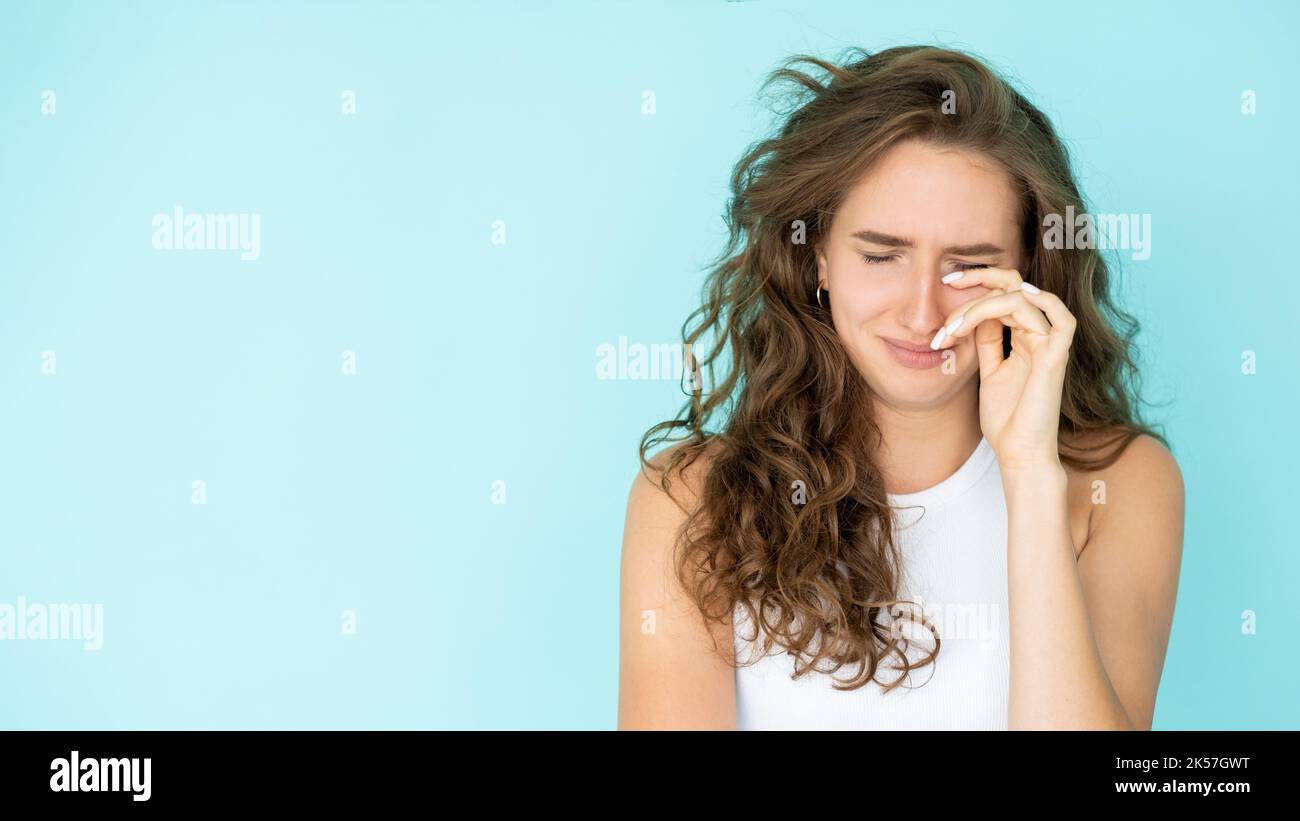 offended situation crying woman upset emotion Stock Photo