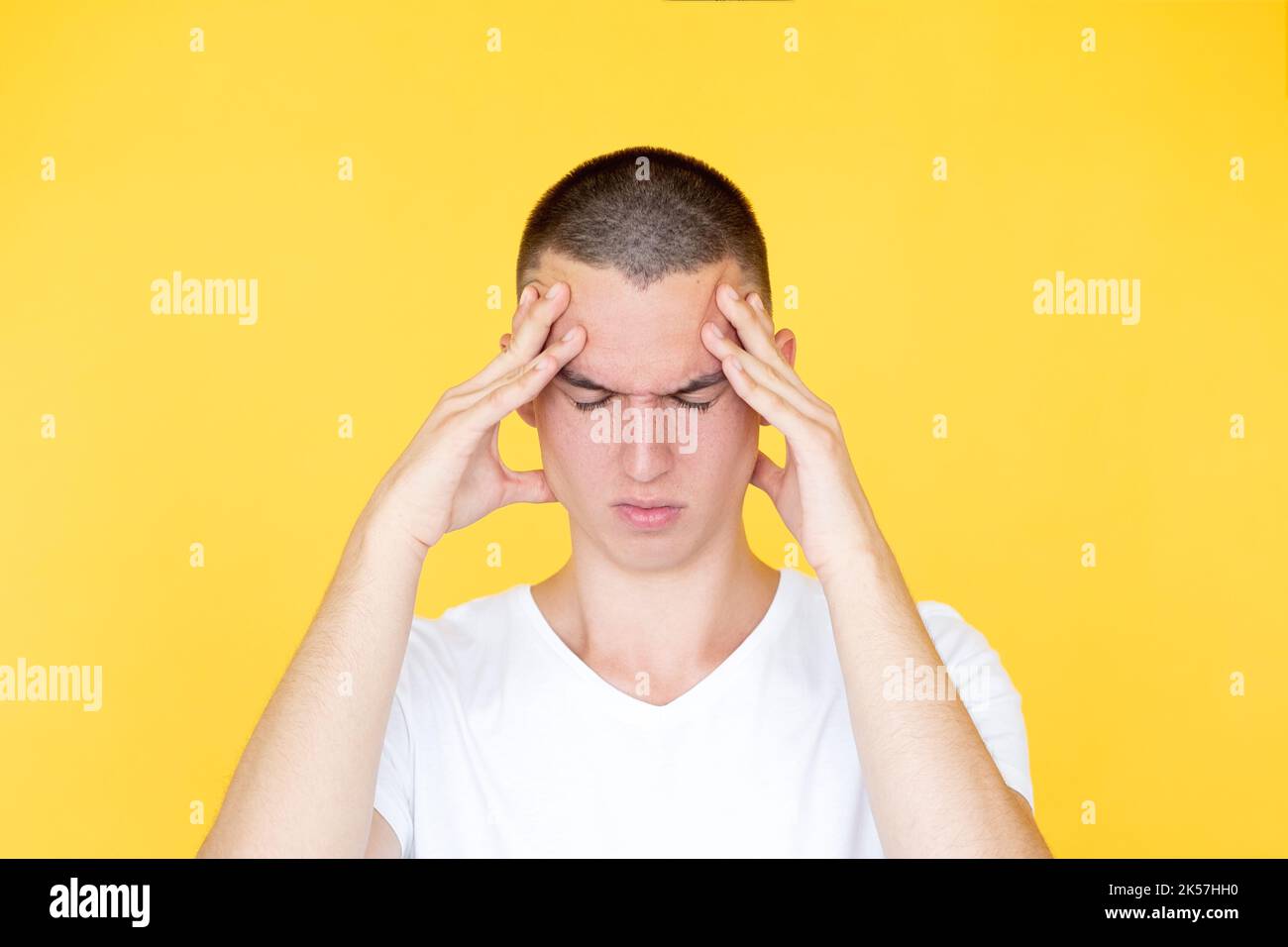 considering idea concentrated man overload Stock Photo