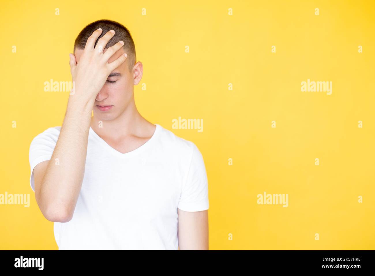 facepalm gesture shocked man epic fail embarrassed Stock Photo