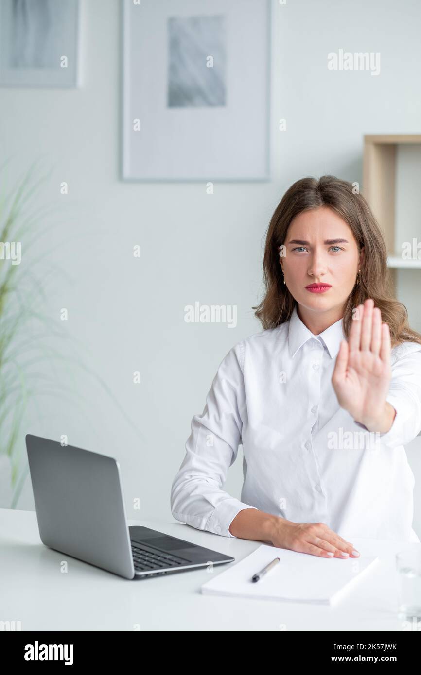 work protest strict woman unpleasant situation Stock Photo