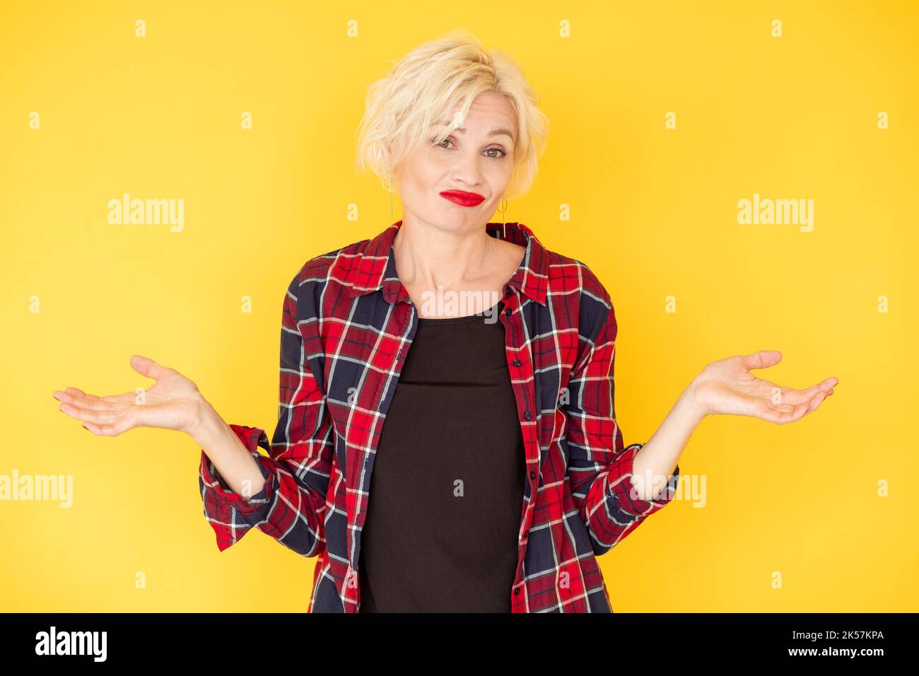 shrugging hands skeptic woman unsure emotion Stock Photo