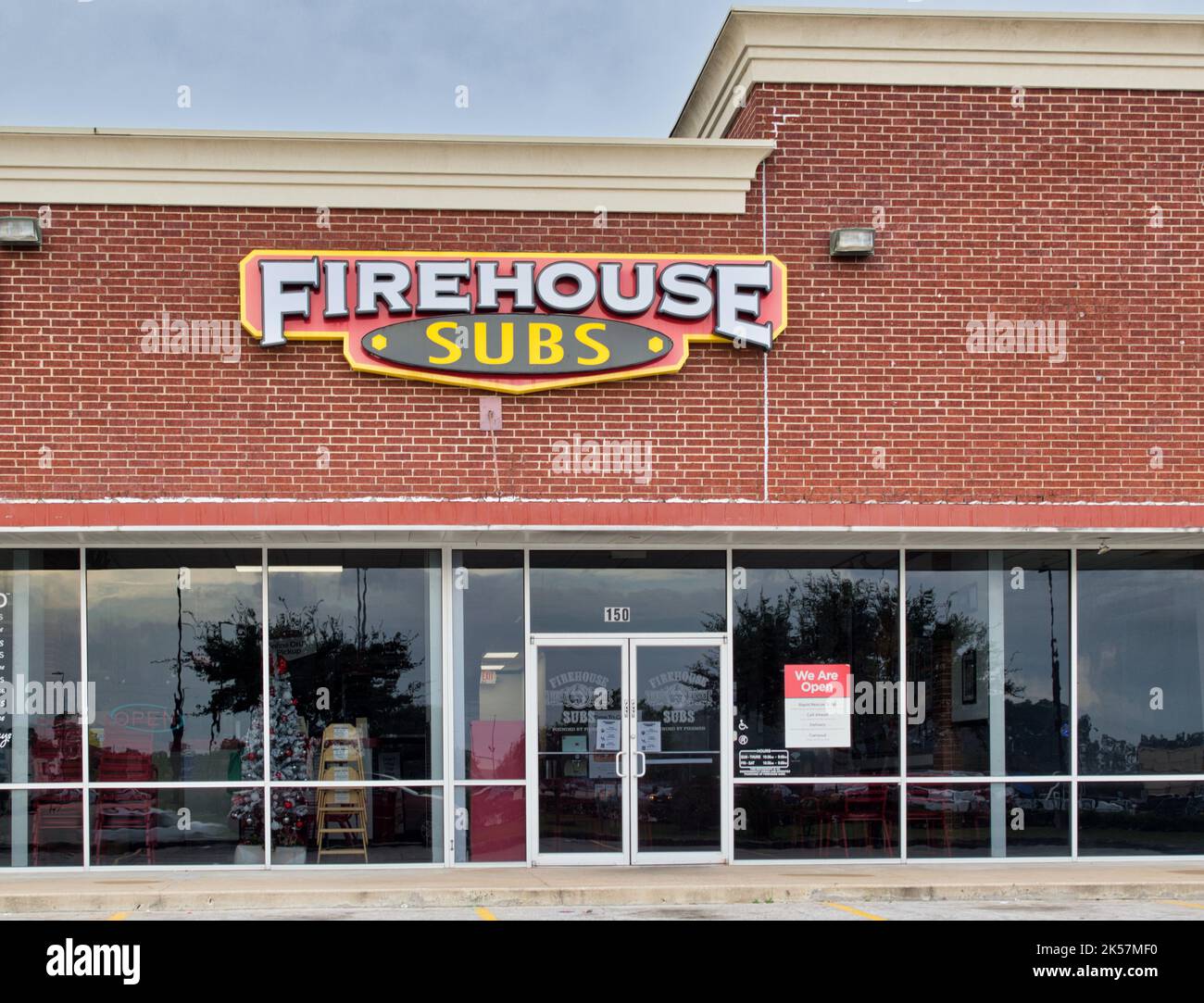 Houston, Texas USA 12-03-2021: Firehouse Subs business storefront exterior in Houston, TX. American restaurant chain founded in 1994. Stock Photo