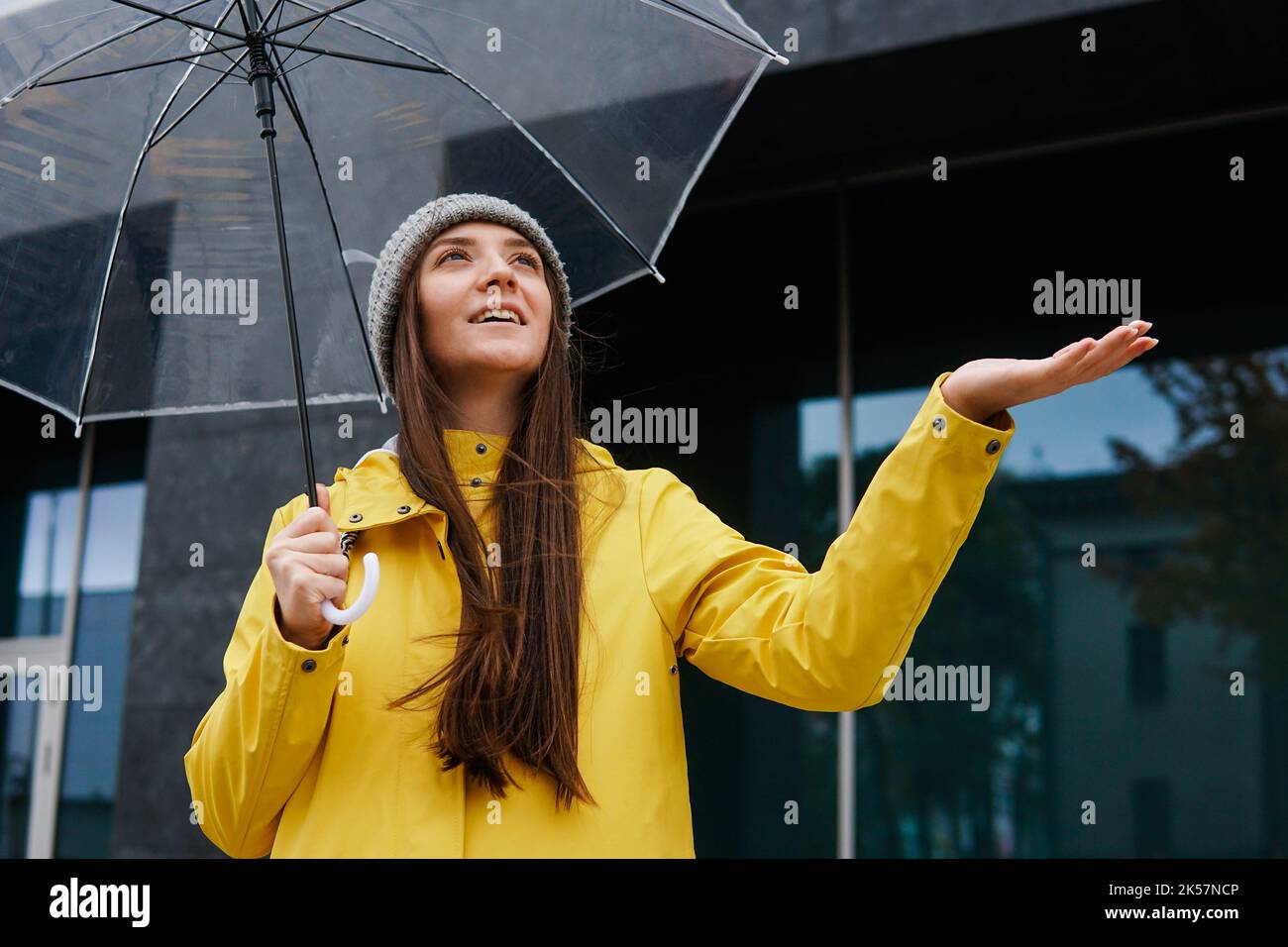 Female in raincoat hi-res stock photography and images - Alamy