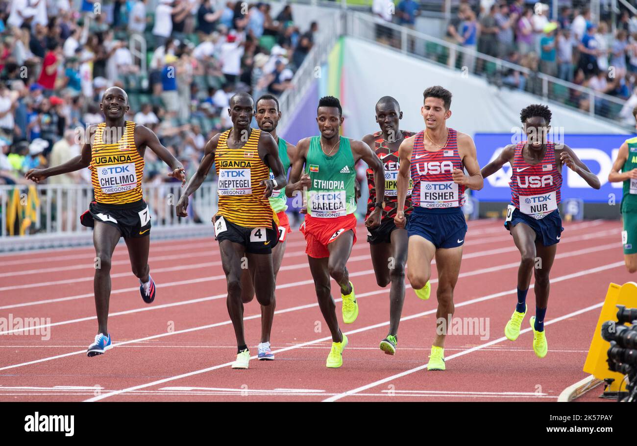 Oscar Chelimo and Joshua Cheptegei of Uganda competing in the men’s 5000m heats at the World Athletics Championships, Hayward Field, Eugene, Oregon US Stock Photo