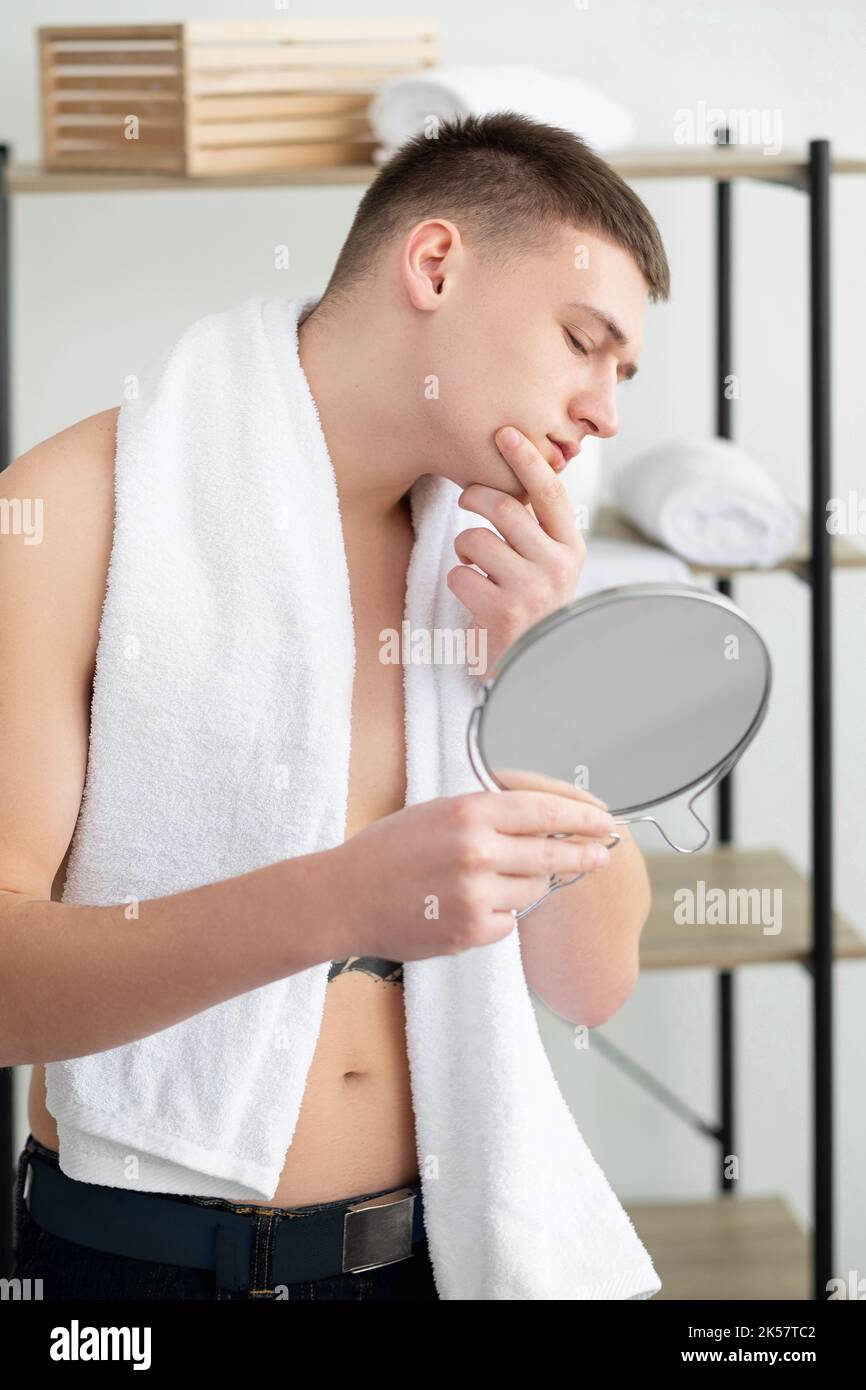 morning bathroom routine perfect skin man face Stock Photo