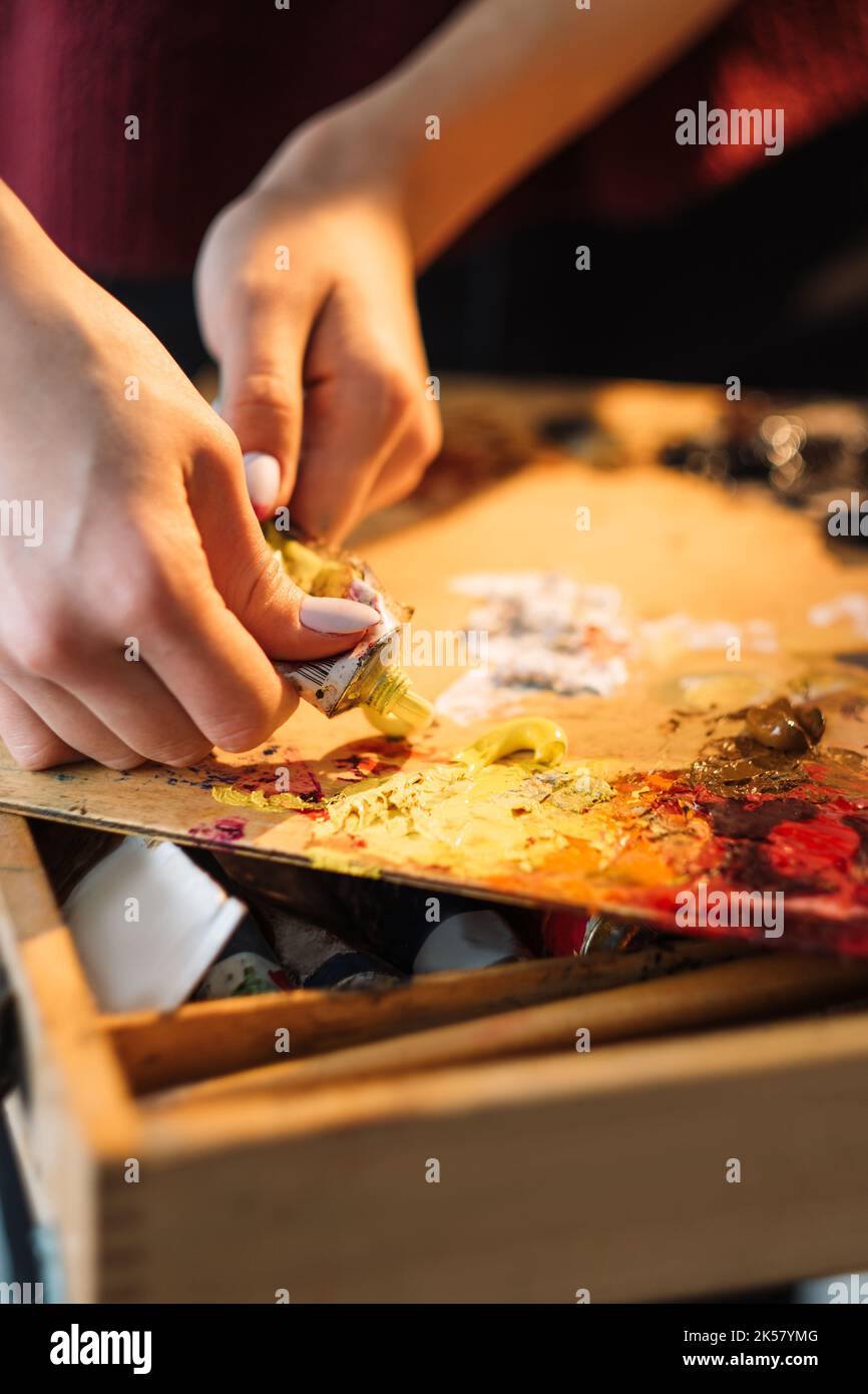 professional painting hands applying acrylic paint Stock Photo Alamy
