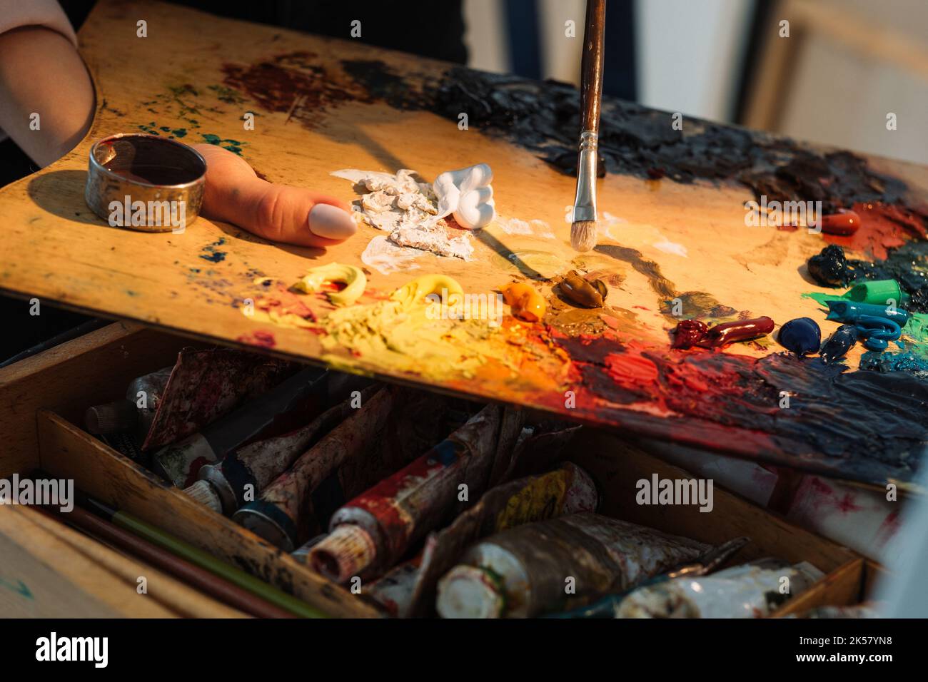 painting process artist tools hand paint palette Stock Photo
