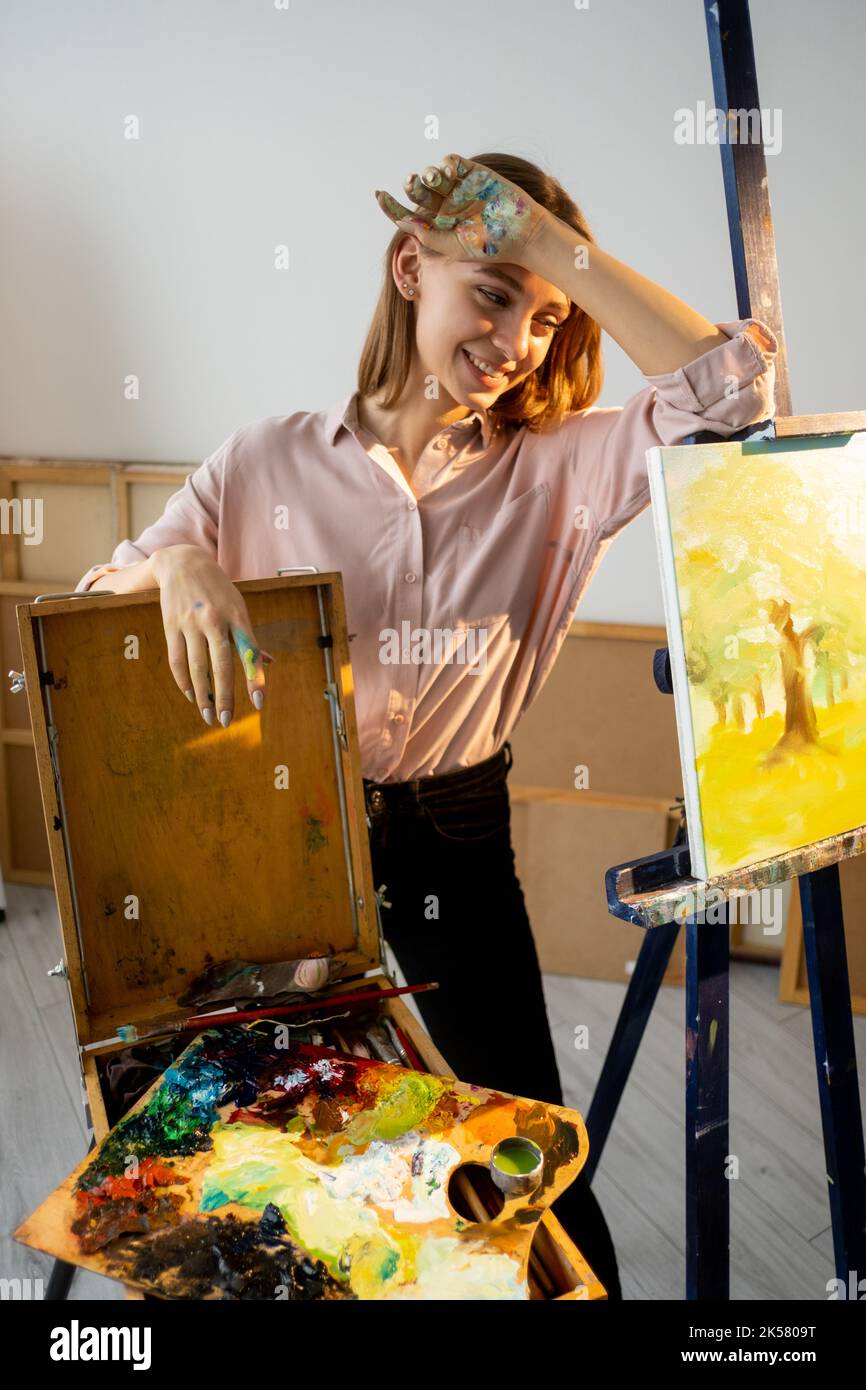 creative hobby hand painting tired smiling artist Stock Photo Alamy