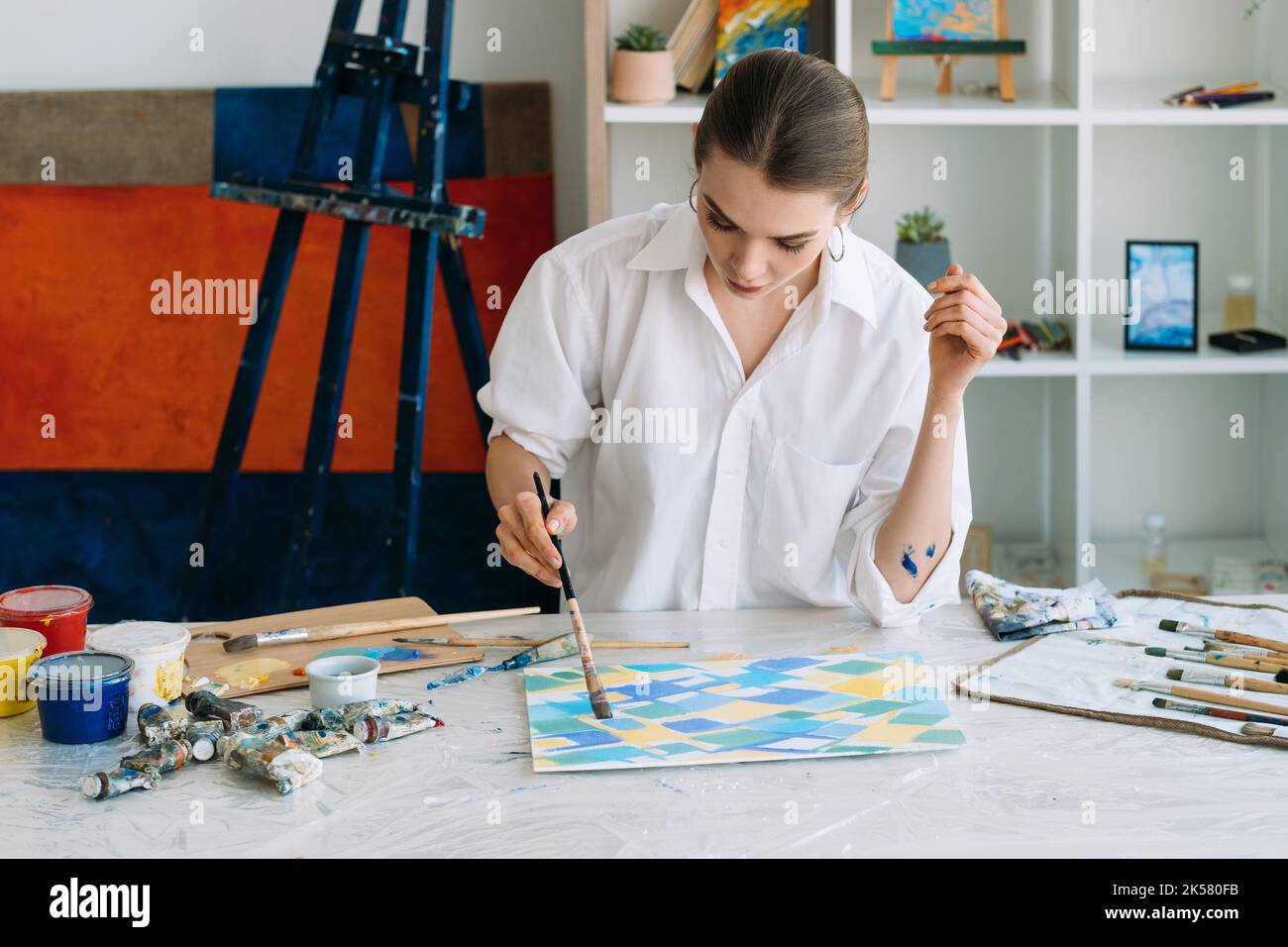 creative hobby visual art artist woman painting Stock Photo