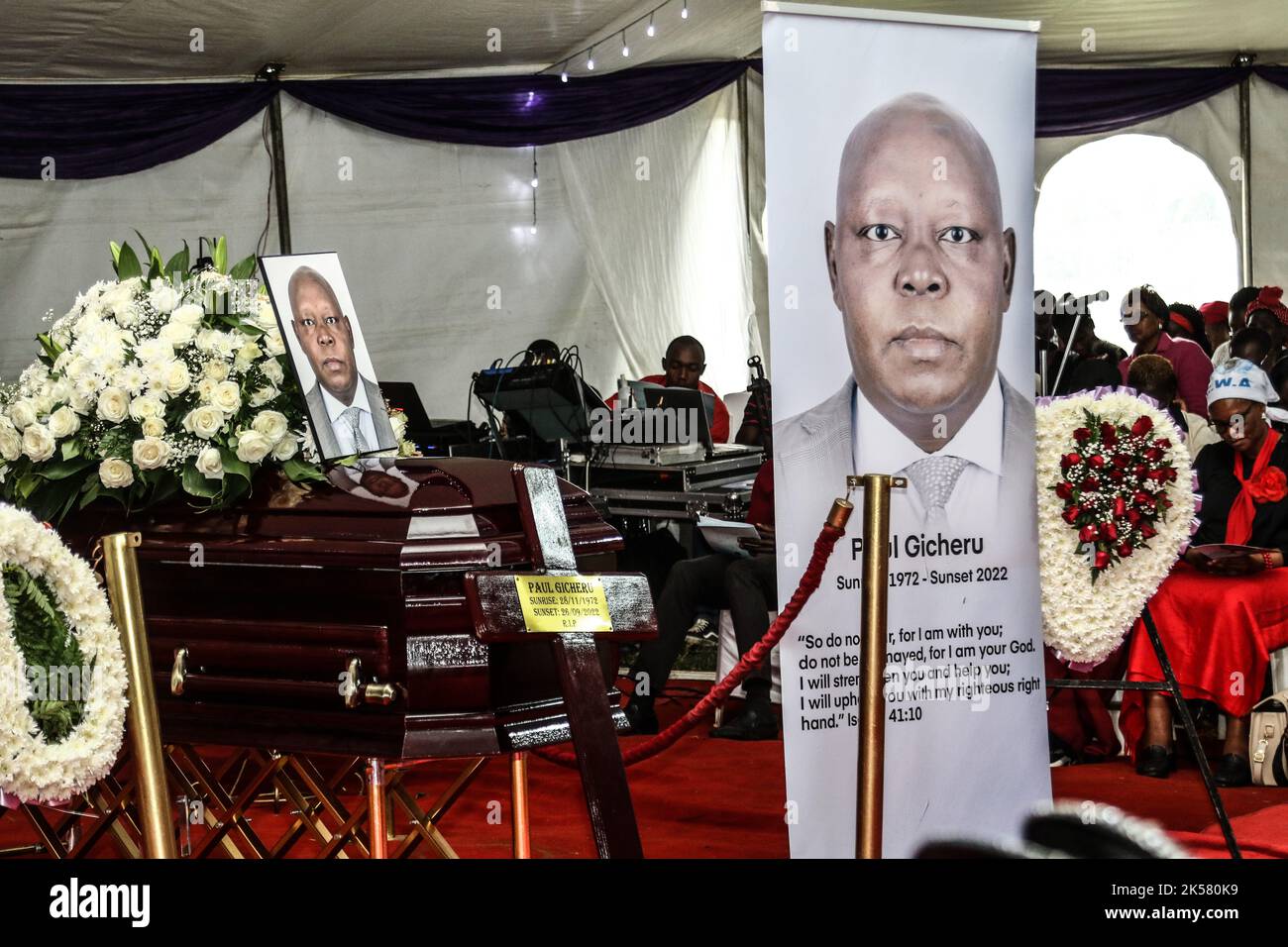 Portraits of Paul Gicheru are seen during his funeral ceremony held in