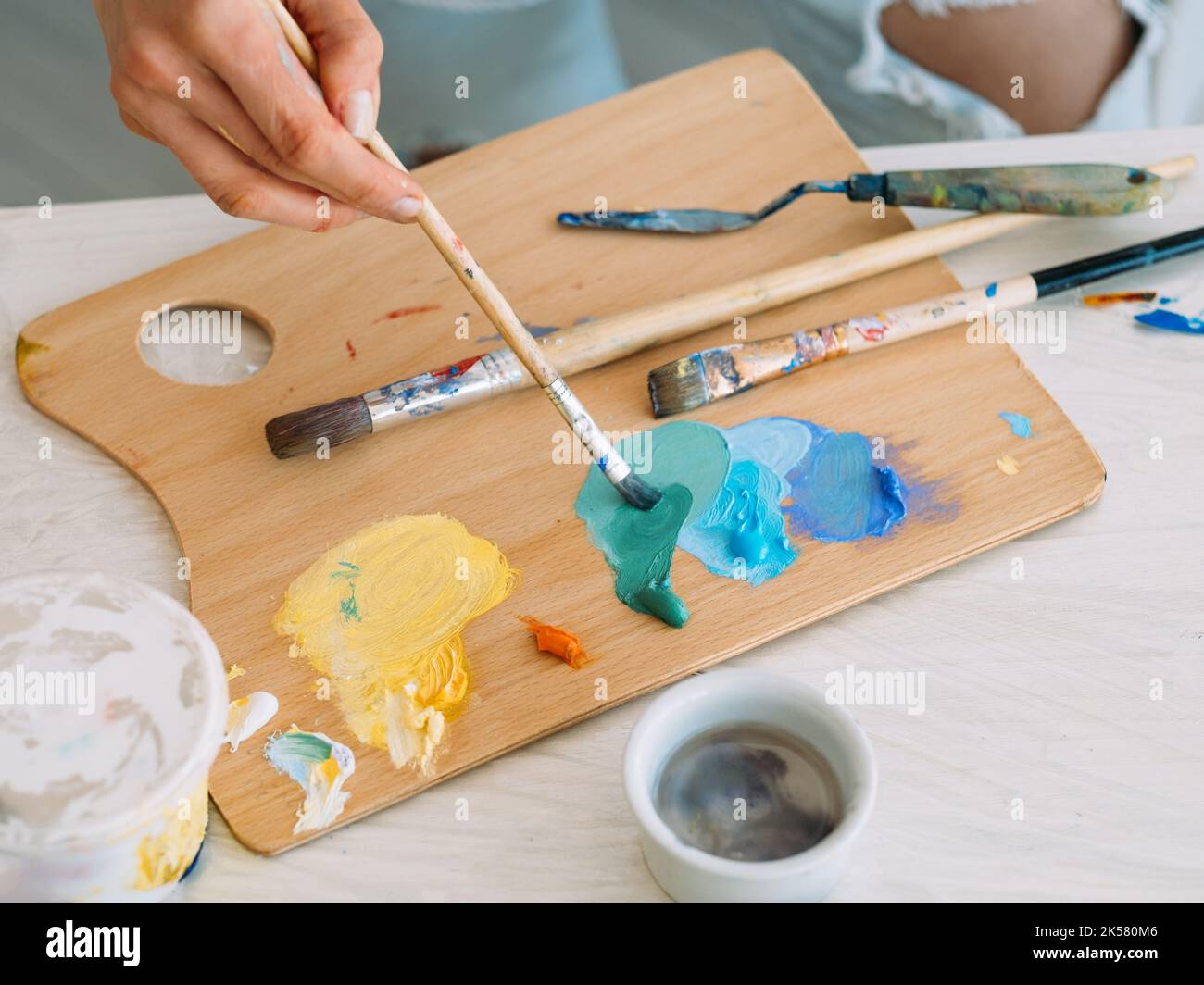 artist workplace painting art hands paint palette Stock Photo Alamy