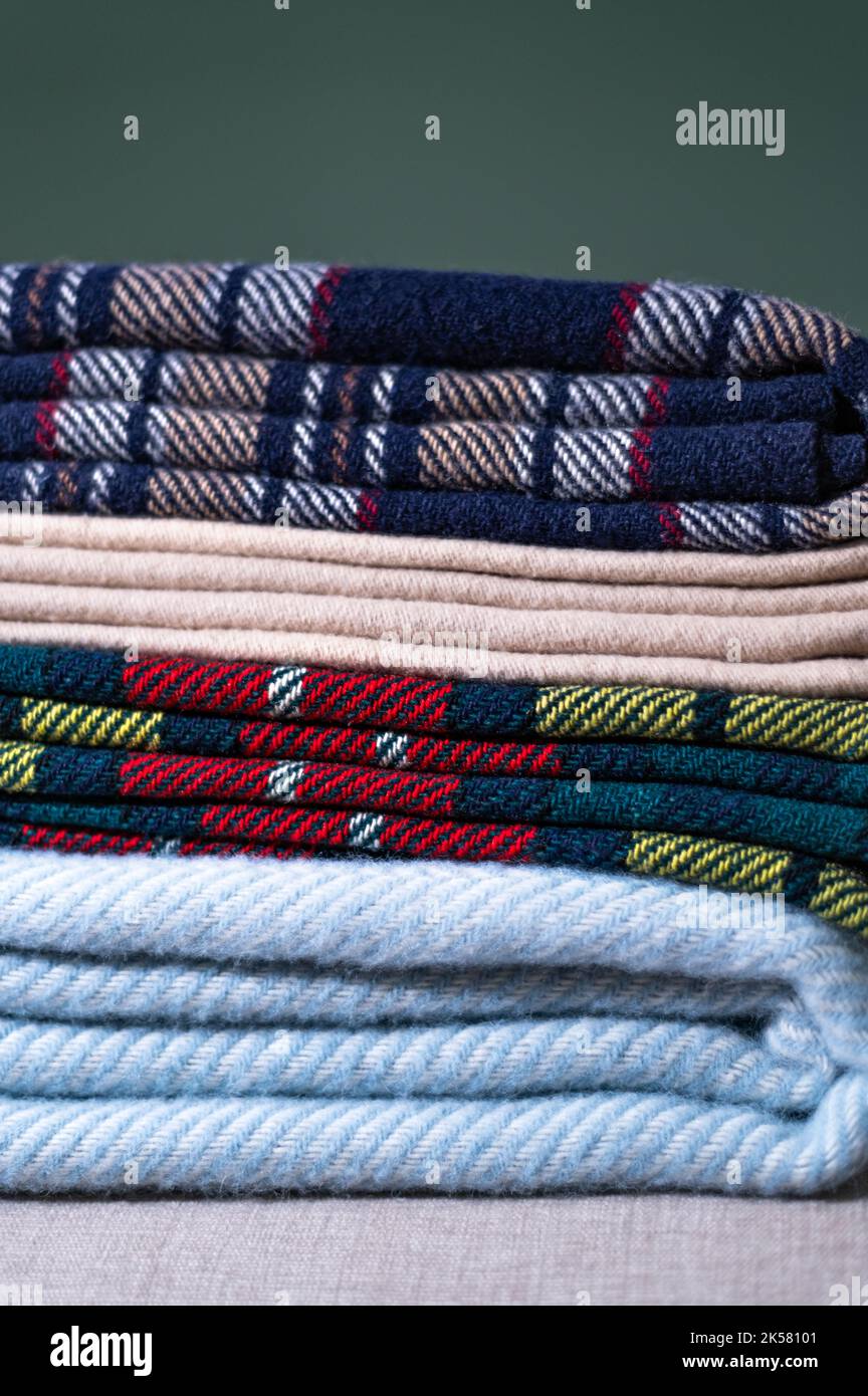 Stack of woolen checked blankets Stock Photo