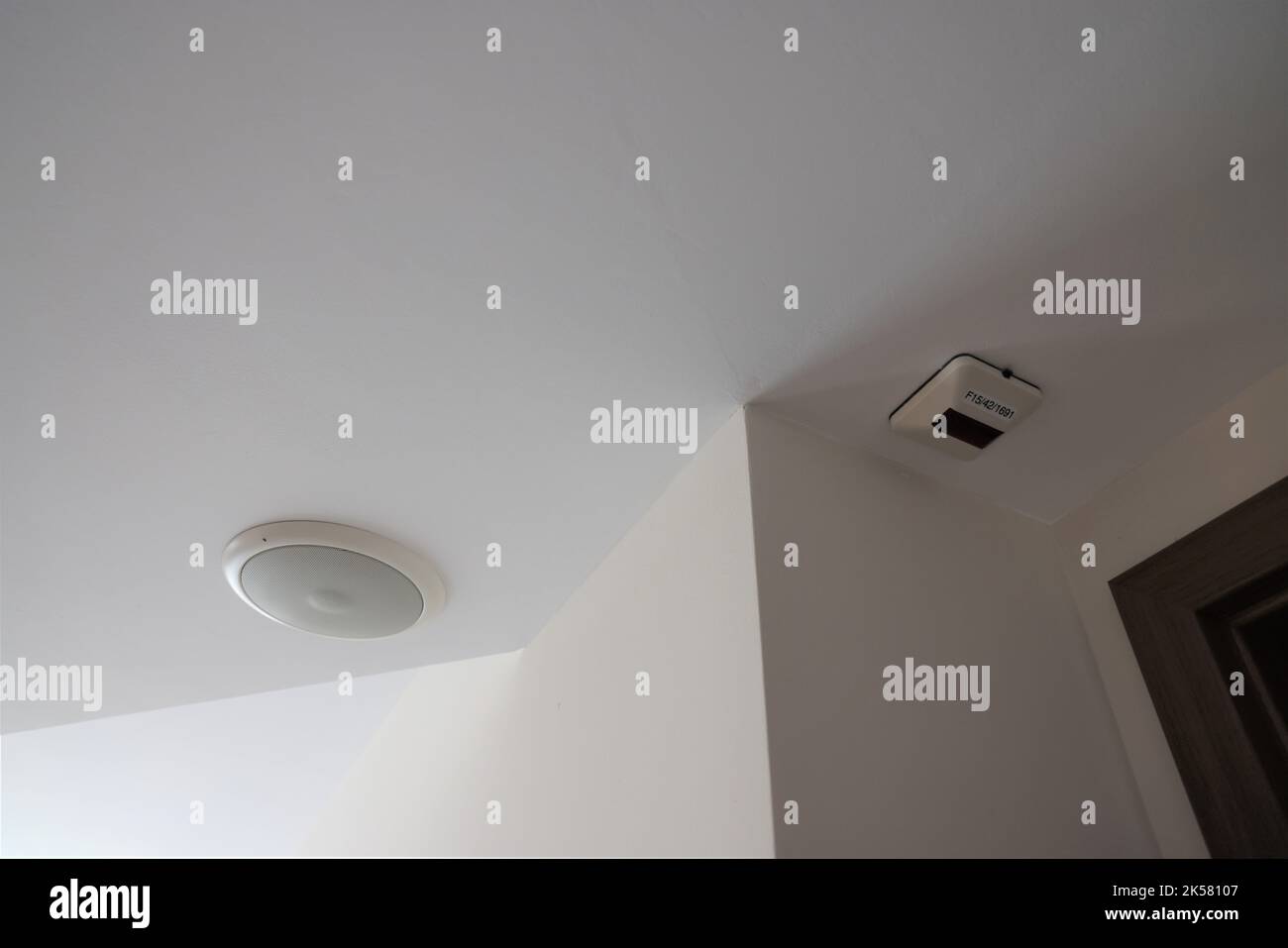 Alarm speaker and remote alarm indicator at a ceiling Stock Photo Alamy