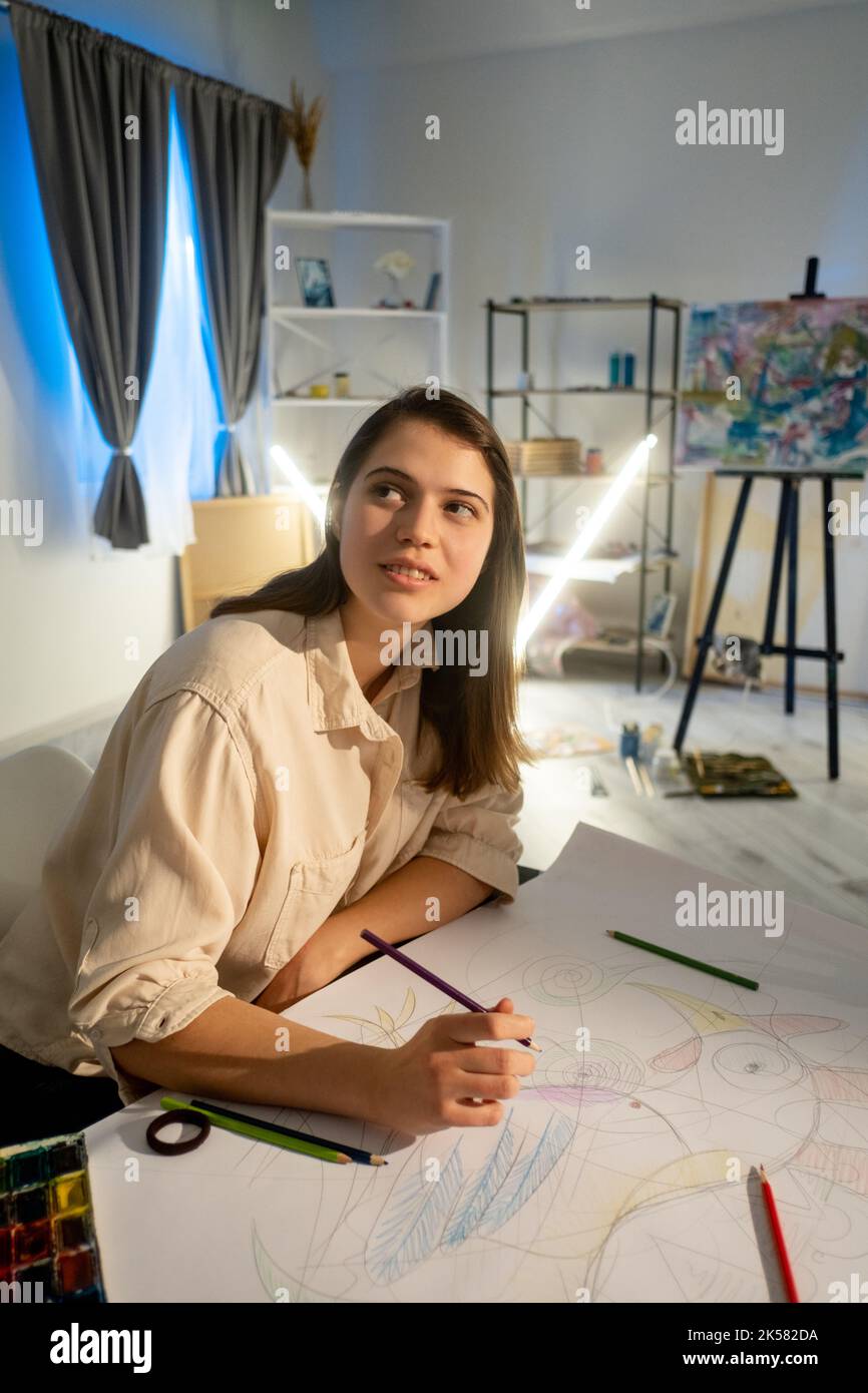 artistic studio inspired woman drawing lesson Stock Photo