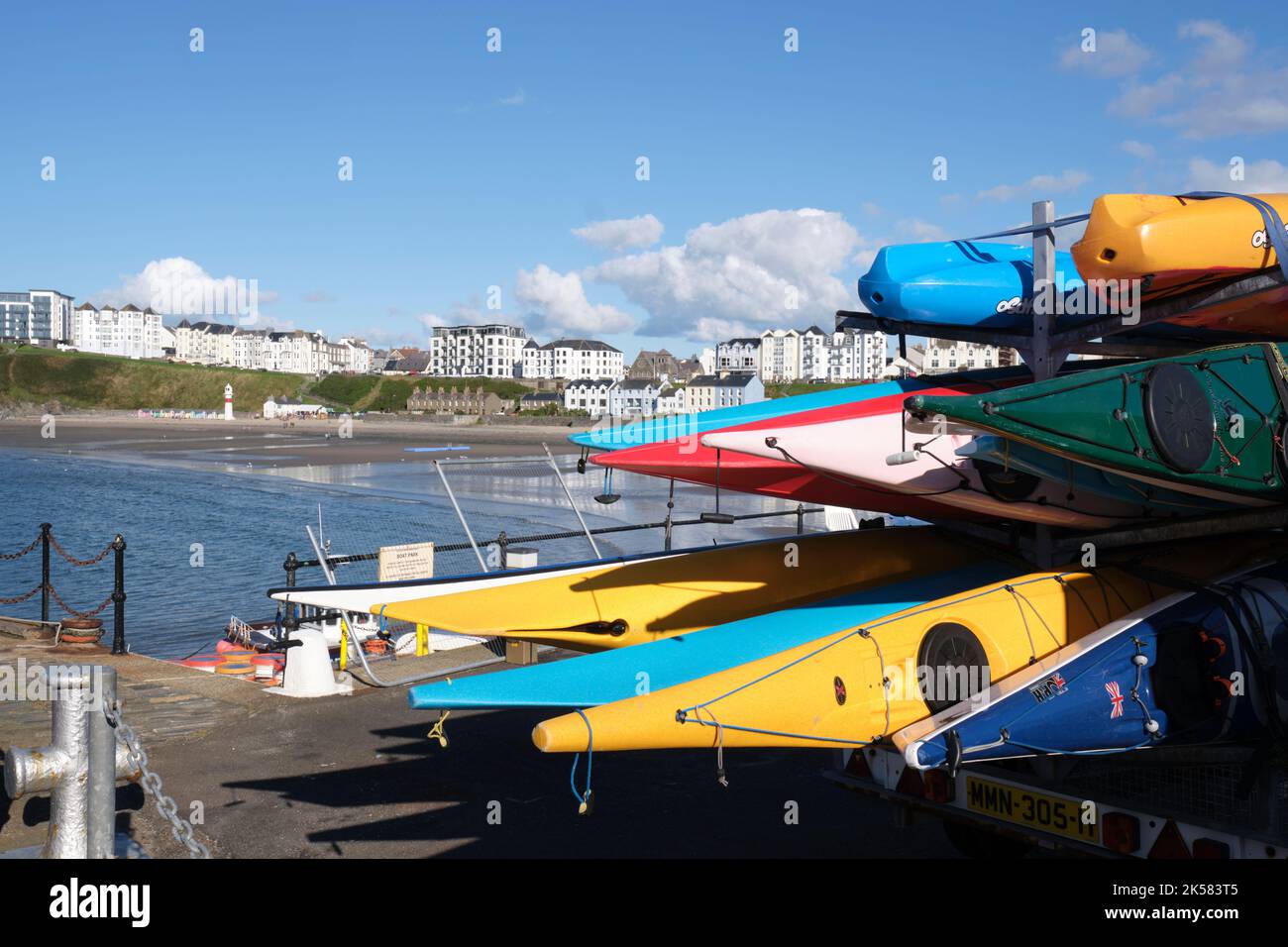 Colourful kayaks stored at the harbour side in Port Erin, Isle of Man