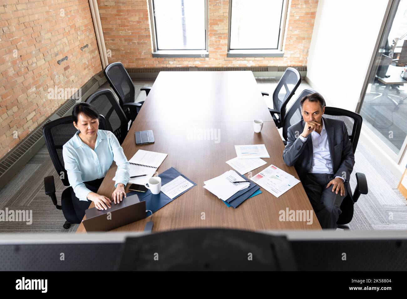 business people looking at screen in conference room meeting Stock Photo