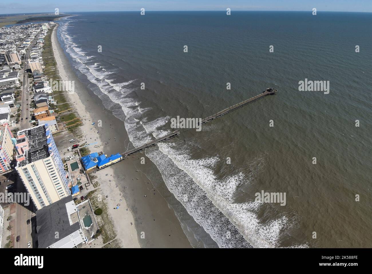 Myrtle Beach, United States. 01 October, 2022. View of the privately owned Cherry Grove Pier damaged by Category 1 Hurricane Ian at the Prince Resort, October 1, 2022 in Myrtle Beach, South Carolina. The storm surge from Hurricane Ian battered the Grand Strand region with high surf and winds. Stock Photo