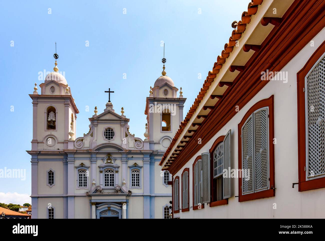 Facade of old colonial houses and church in the historic town of Diamantina in Minas Gerais state, Brazil Stock Photo