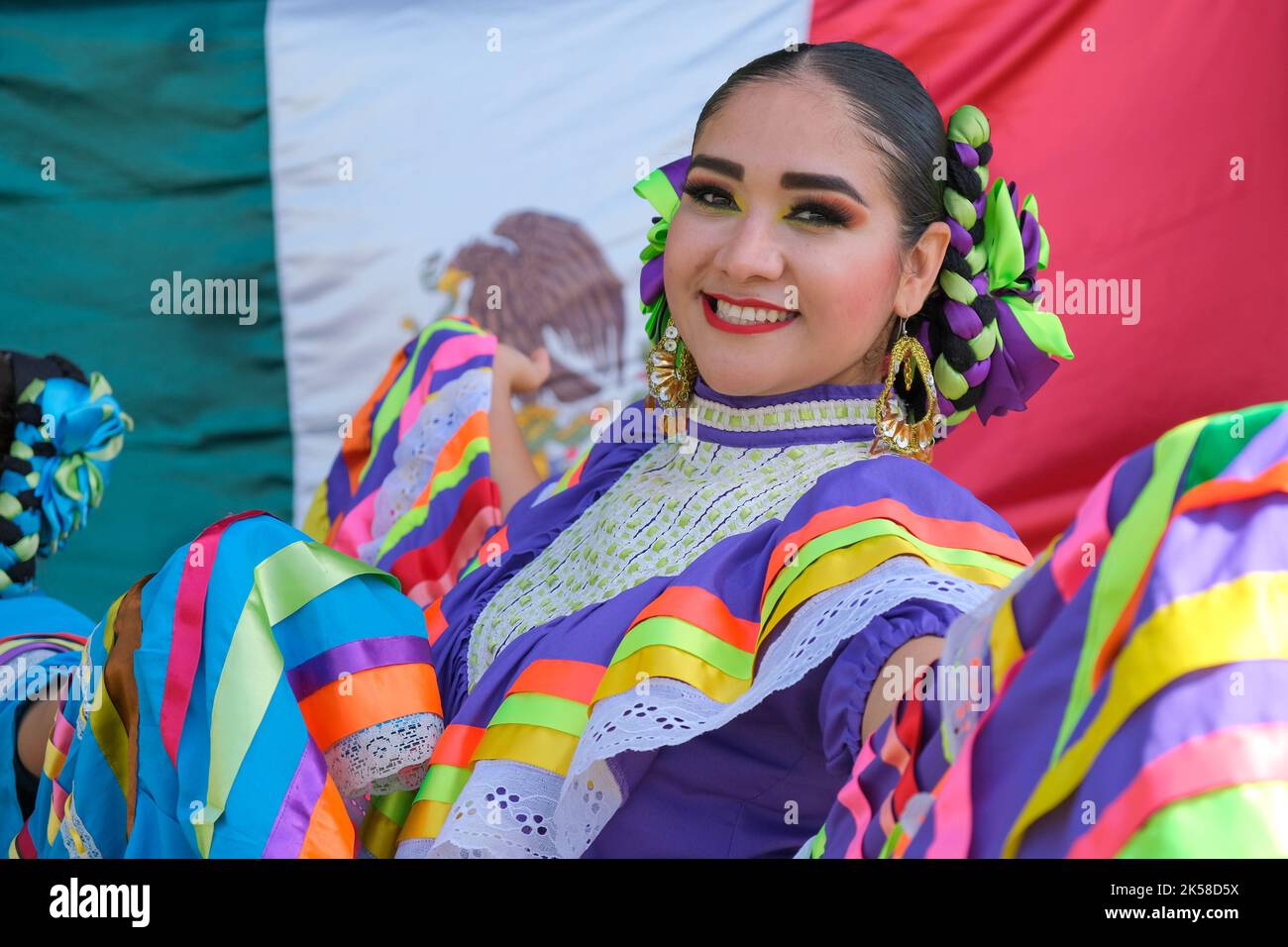 Antalya, Turkey - October 03 2022; Young brunette beautiful mexican traditional girl, folkloric dancer with colorful dresses. Stock Photo