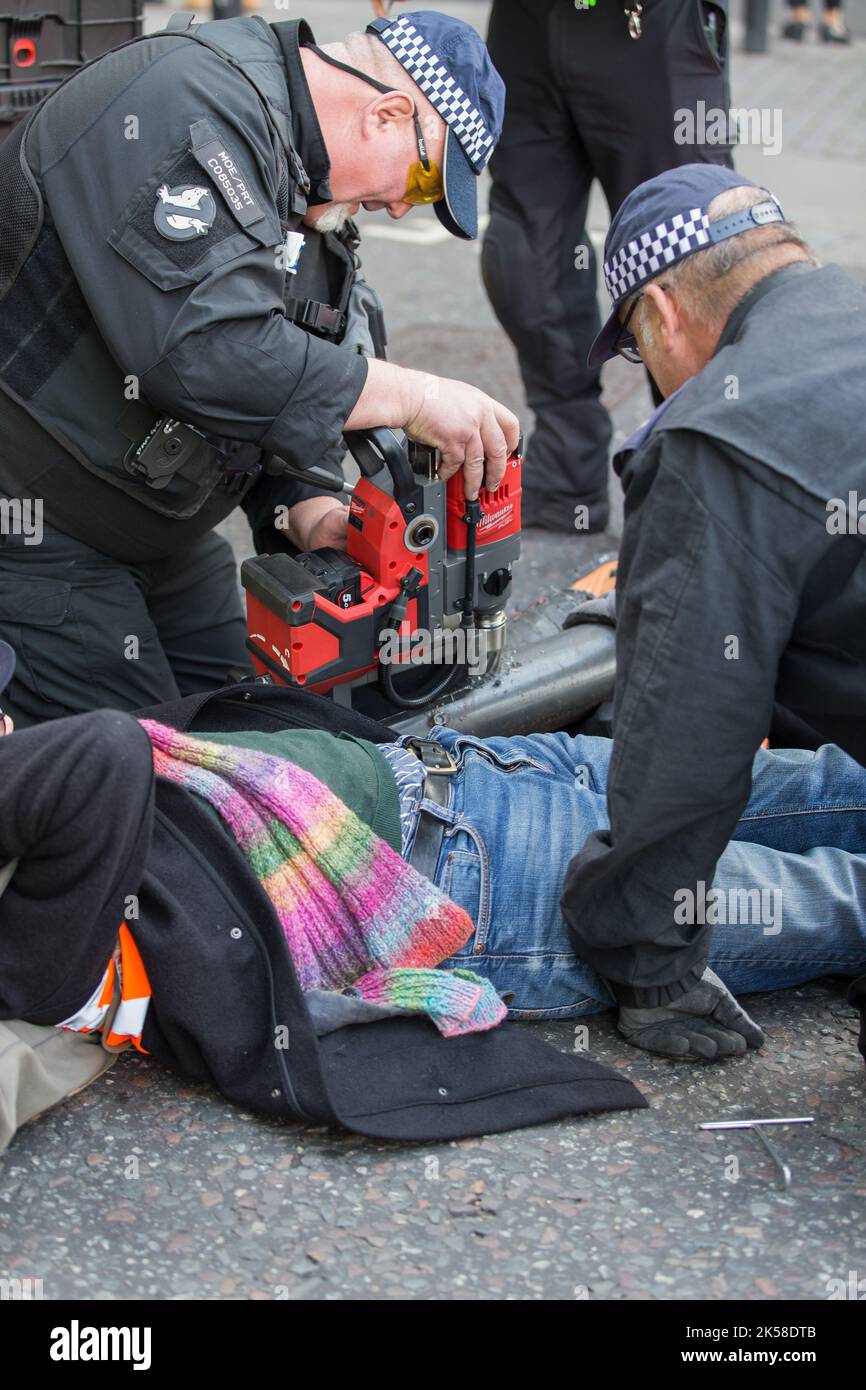 London UK 6th.Oct,2022.just stop oil protesters block roads around Trafalgar Square and specialist police teams to remove them Stock Photo