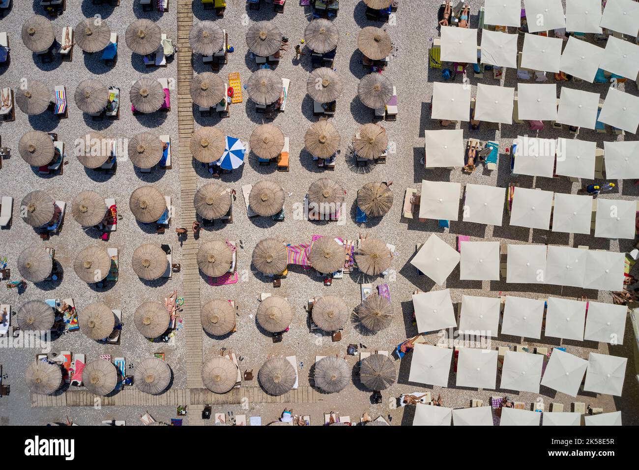 Top view of the beach with beach umbrellas in Montenegro. Stock Photo