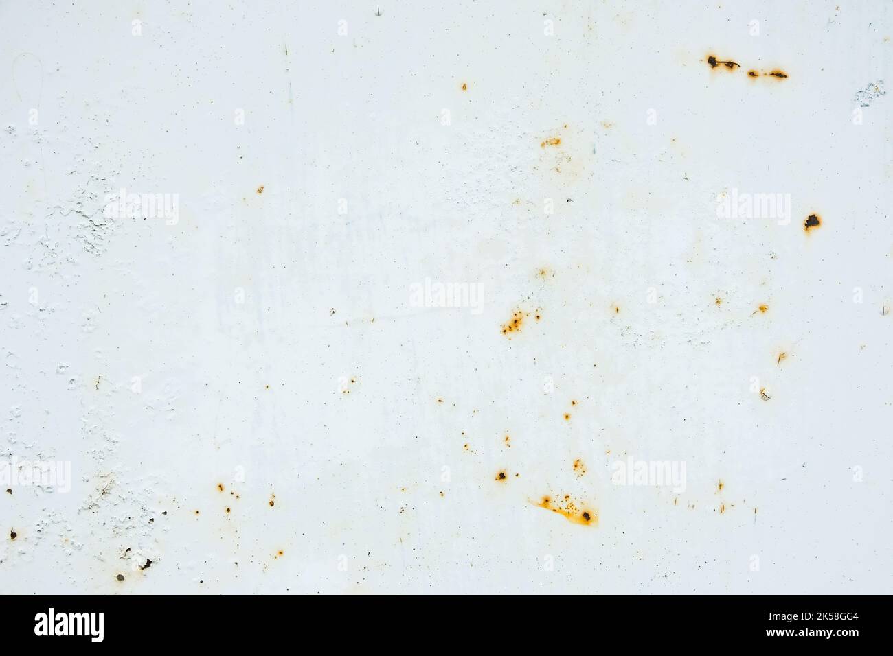 Corrosion of metal. Rust shows through the white paint. Rusty texture ...