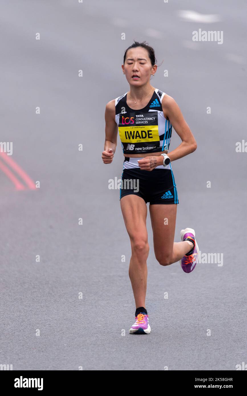 Reia Iwade racing in the TCS London Marathon 2022 Elite Women race in Tower Hill, City of London, UK. Japanese female athlete Stock Photo