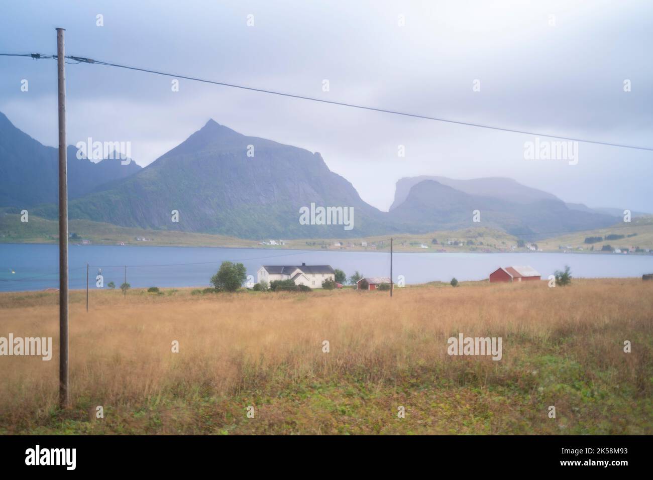 landscape view of a village in the fiords of Lofoten Islands, Norway on a cloudy day Stock Photo