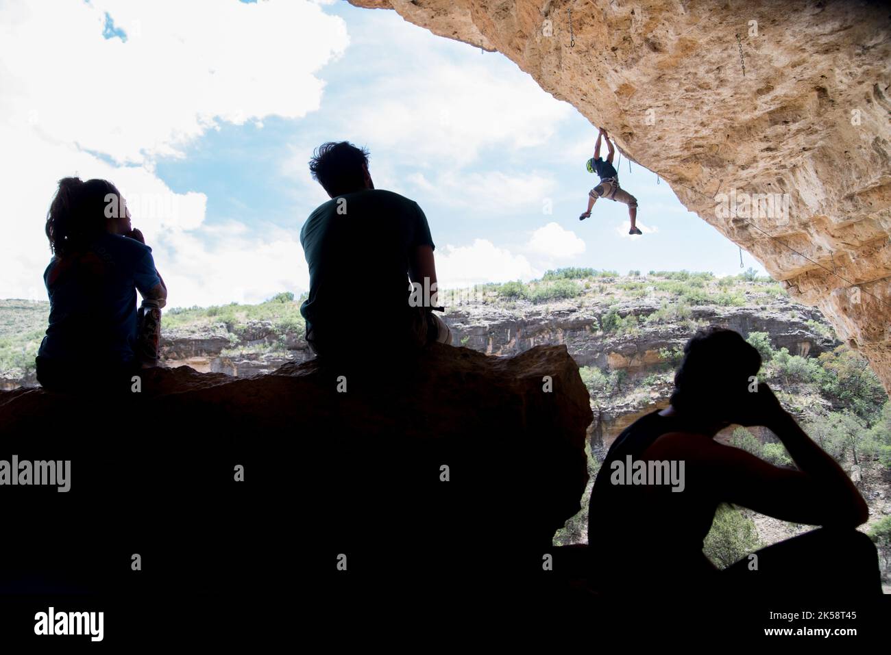Rock Climber in Cave Stock Photo