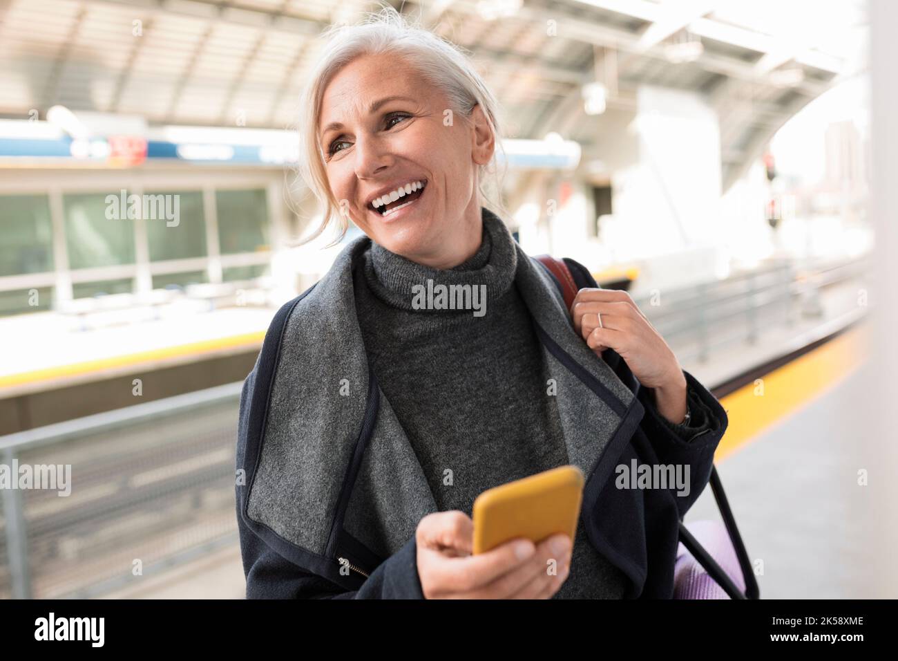 Woman on train platform hi-res stock photography and images - Alamy