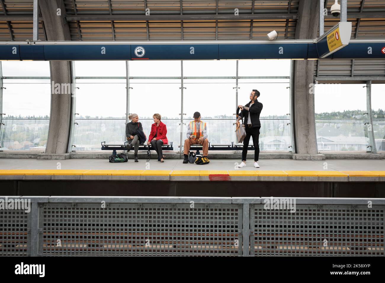 People waiting for the train hi-res stock photography and images - Alamy