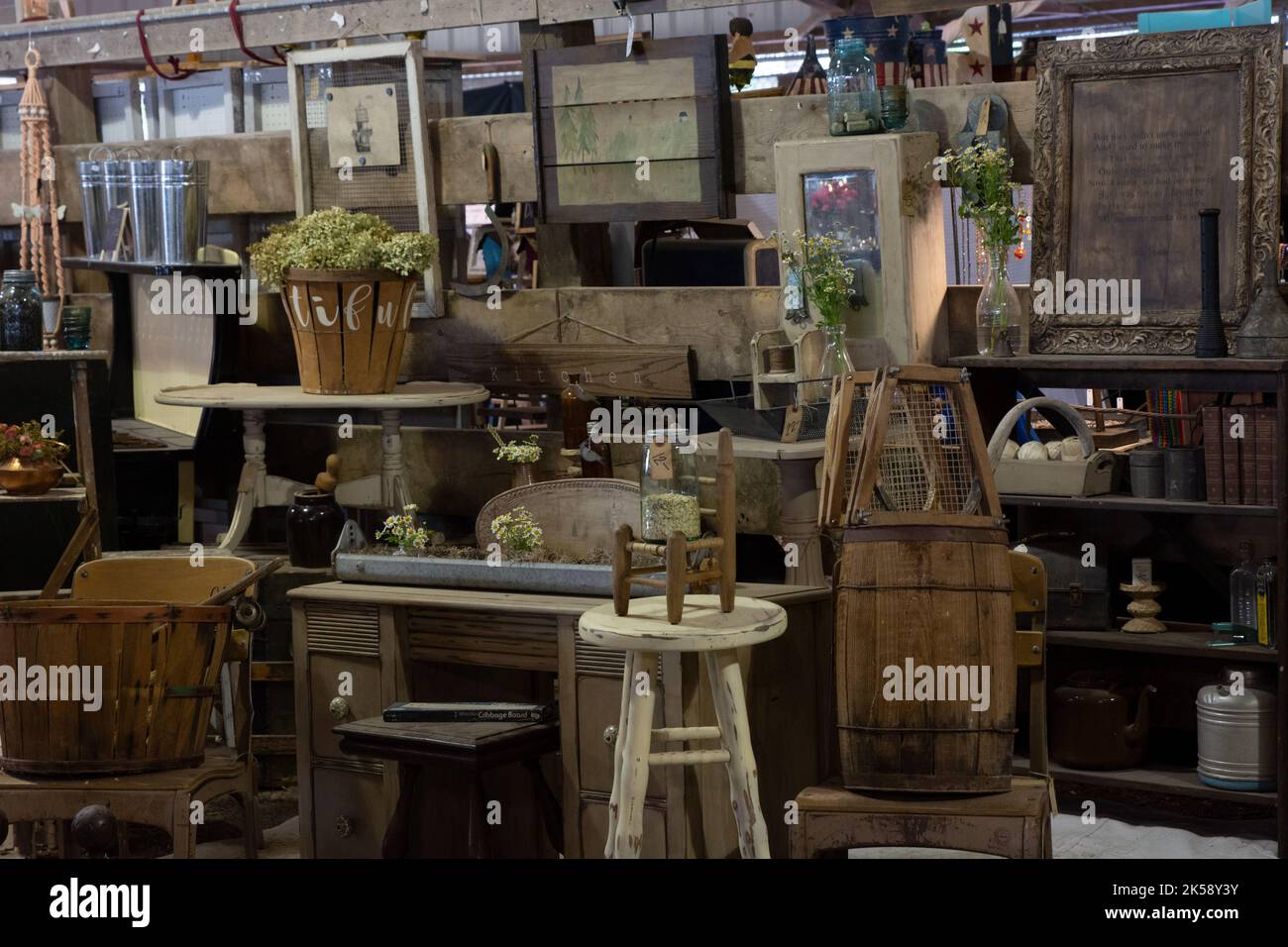 a room full of old wooden furniture and antiques Stock Photo