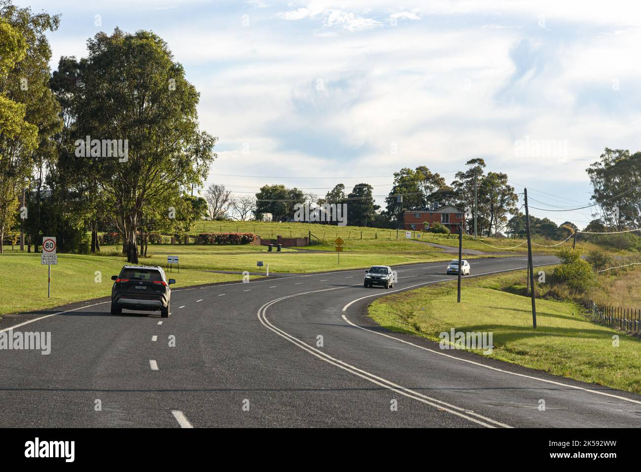 Cars travelling on Silverdale Road in the early spring Stock Photo