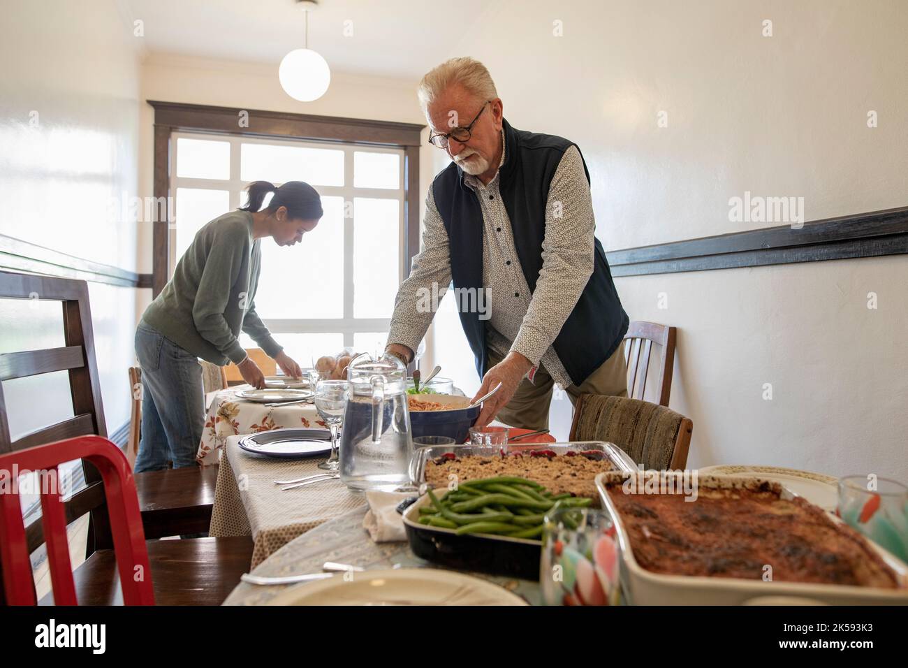 Placing food on the table hires stock photography and images Alamy