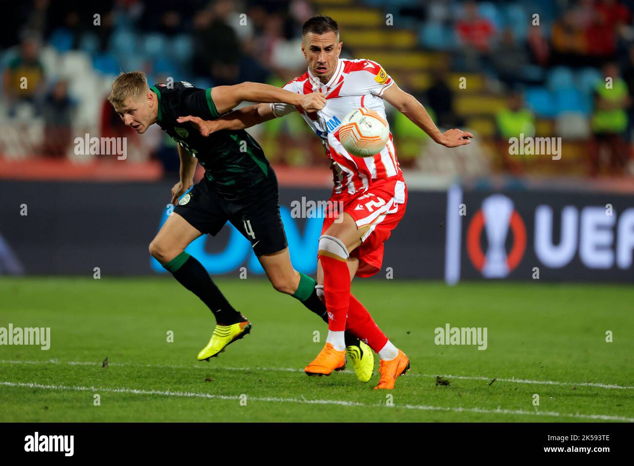Matija Ljujic of Ujpest FC fights for the possession with Amer