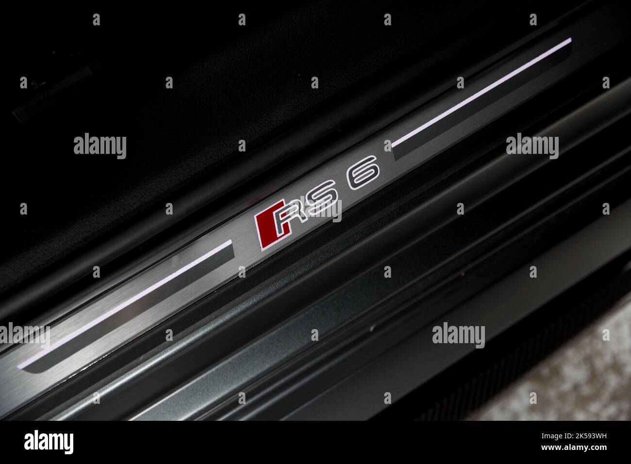 The RS6 Model Designation Badge On The Illuminated Door Sill Of A 2021