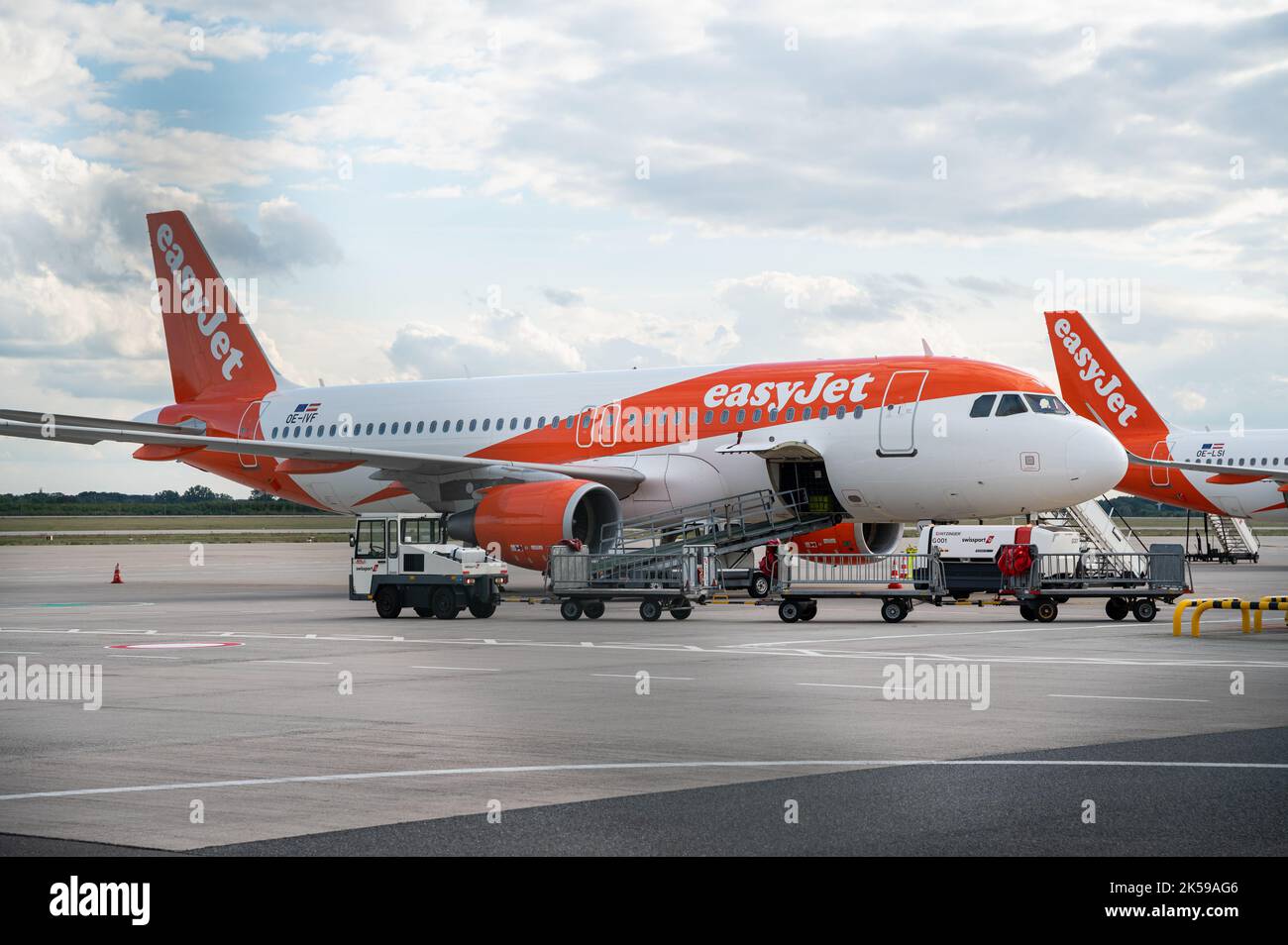 30.08.2022, Germany, Berlin - An Airbus A320-200 passenger aircraft of EasyJet Europe with the registration OE-IVF is parked on the apron at Berlin Br Stock Photo