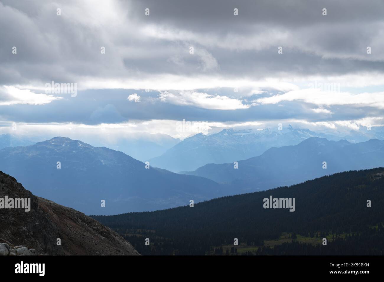 Clouds shrouding the mountain view atop Panorama Ridge. Stock Photo